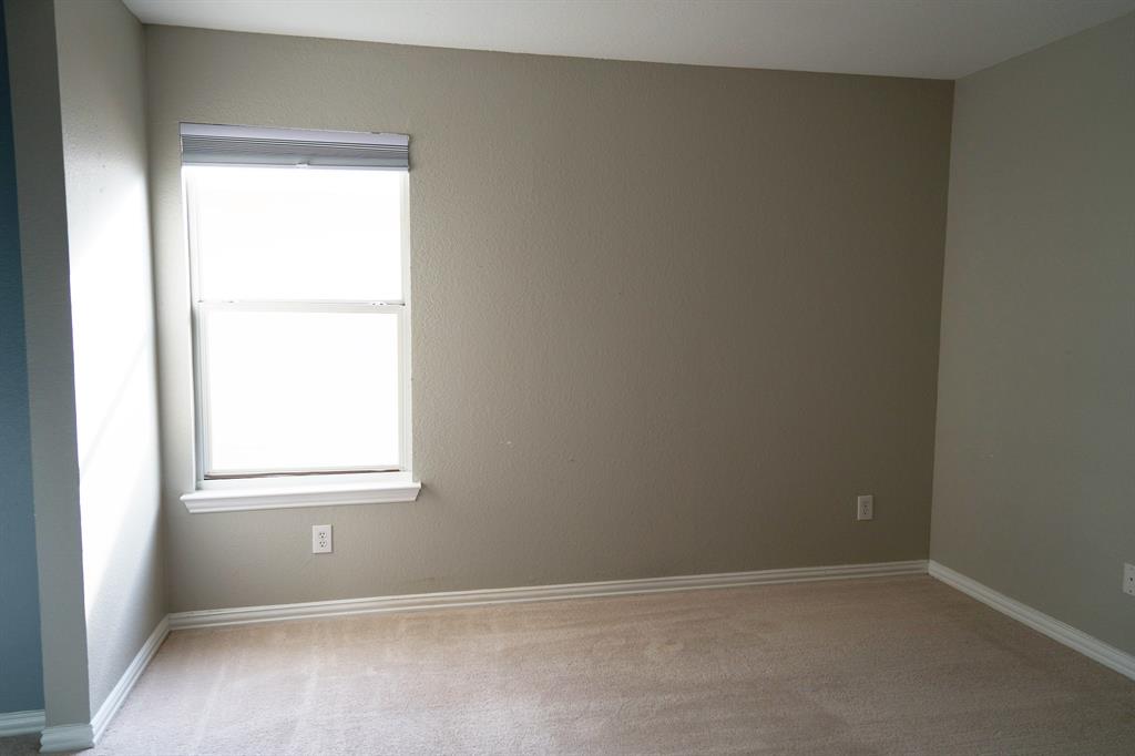 4469 Big Sky Drive Plano, TX 75024 - Photo 29 of 39 an empty room with a window
