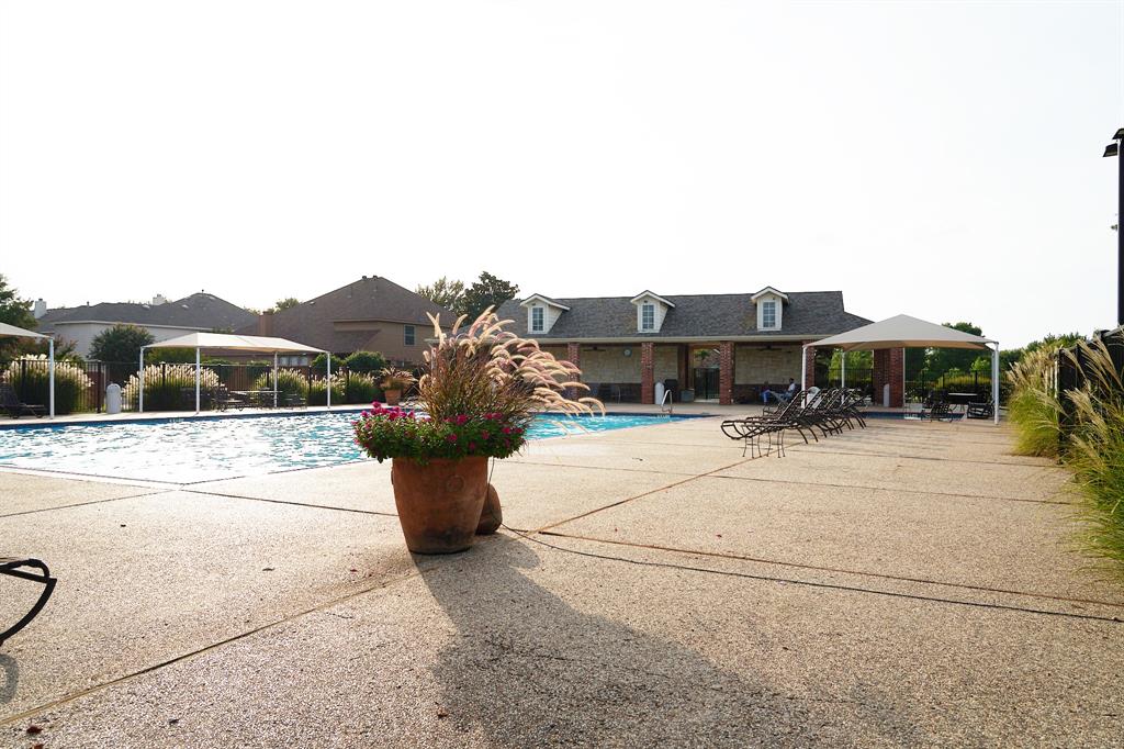 4469 Big Sky Drive Plano, TX 75024 - Photo 38 of 39 a view of a terrace with a bench