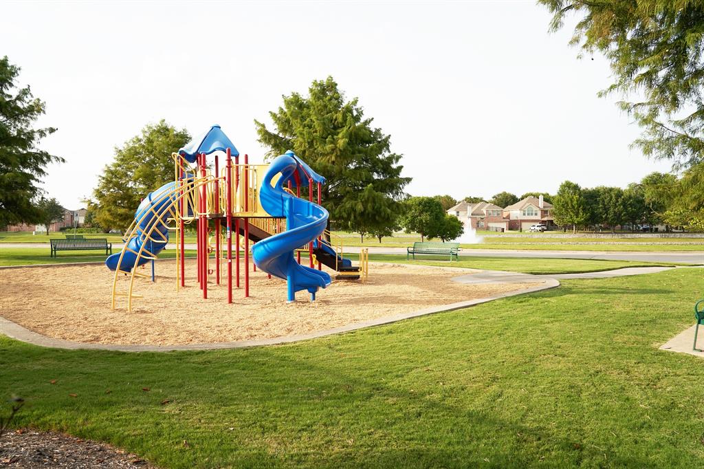 4469 Big Sky Drive Plano, TX 75024 - Photo 39 of 39 a view of park with slide and trees