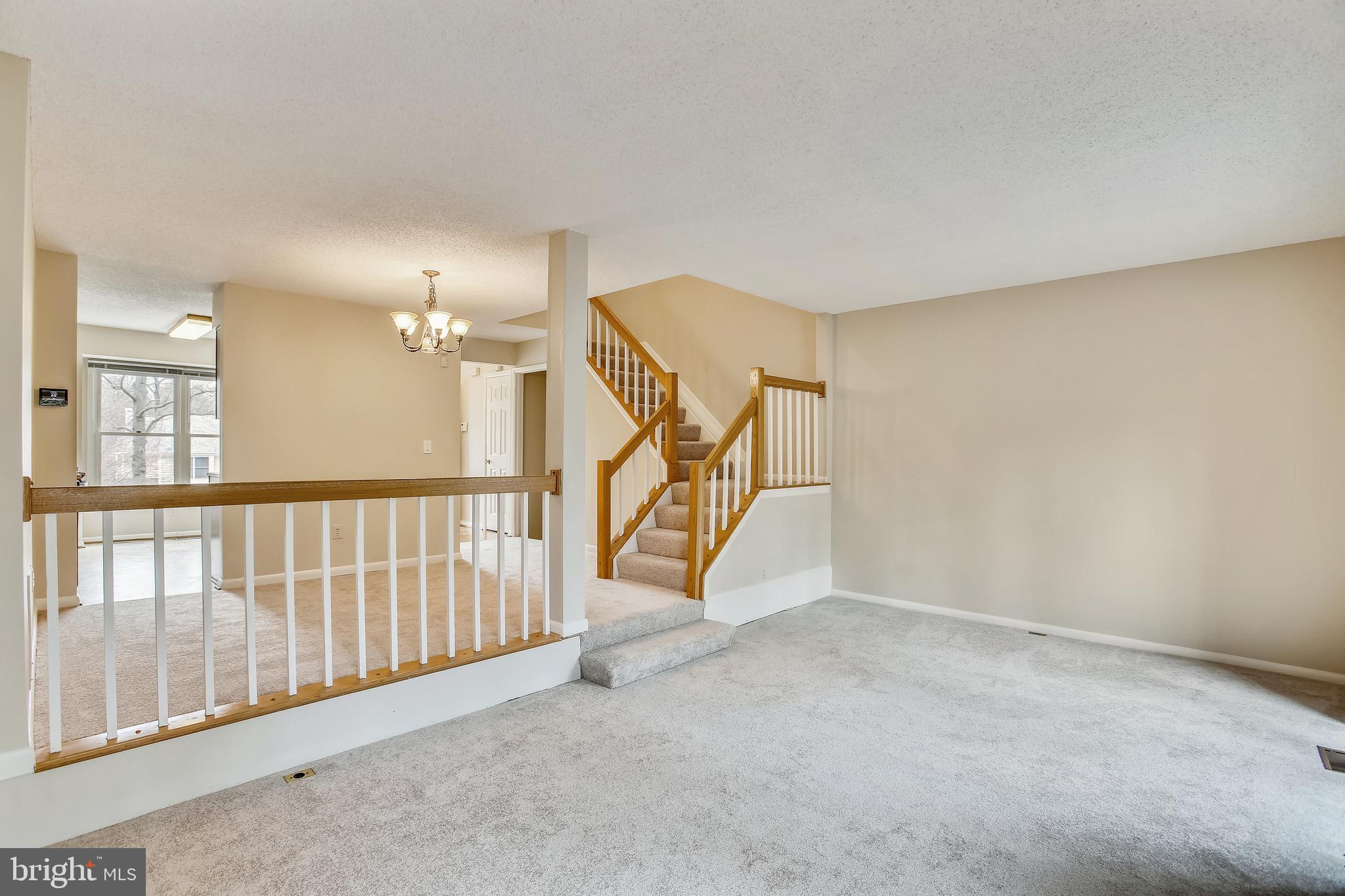 1404 Newport Spring Court Reston, VA 20194 - Photo 14 of 70 Spacious Step-Down Living Room
