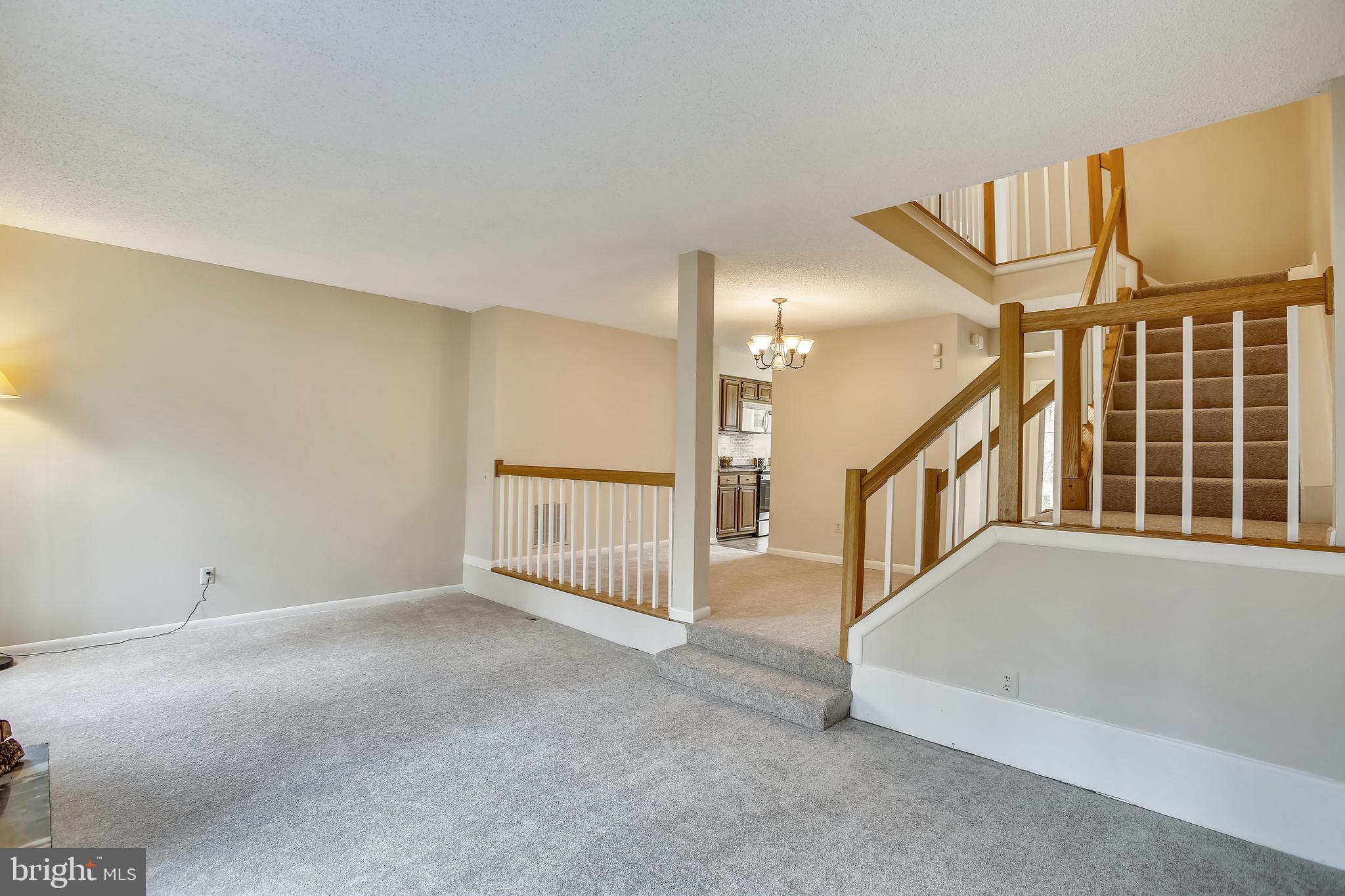 1404 Newport Spring Court Reston, VA 20194 - Photo 15 of 70 Spacious Step-Down Living Room