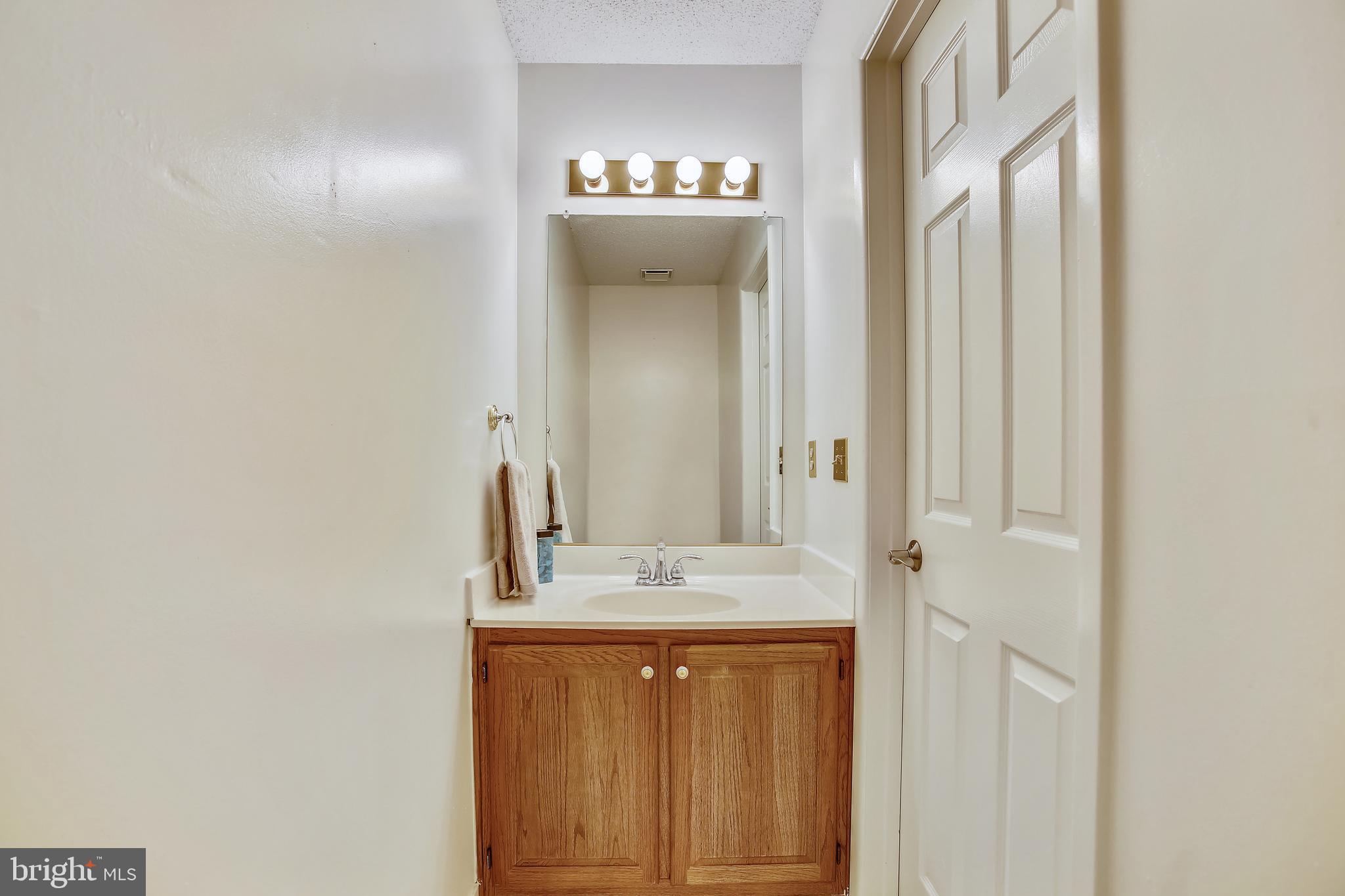1404 Newport Spring Court Reston, VA 20194 - Photo 19 of 70 Main Level Powder Room