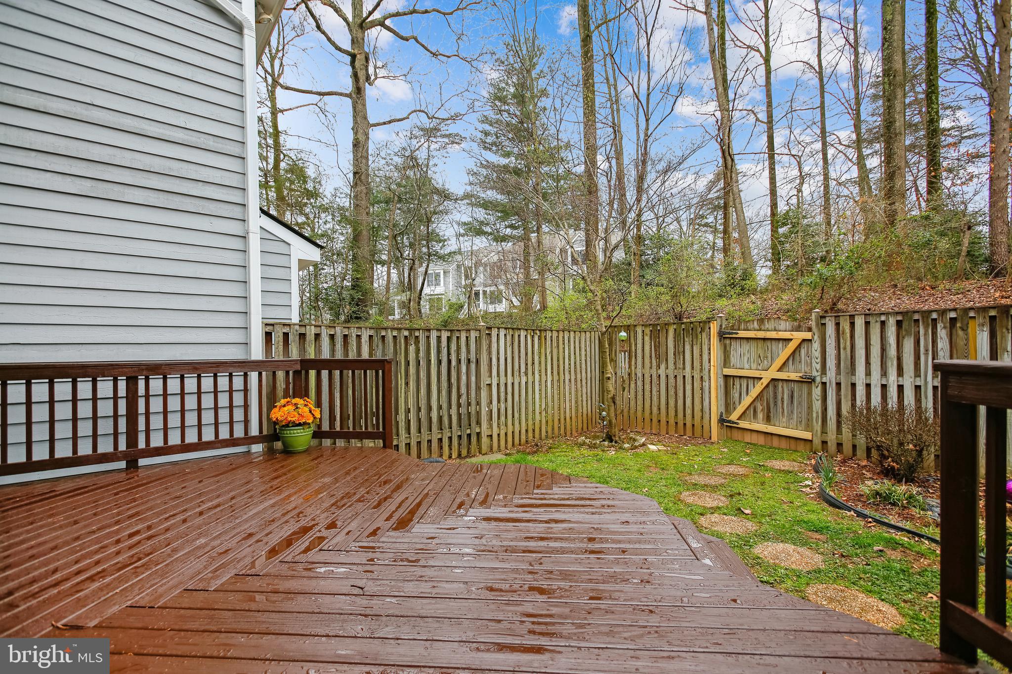 1404 Newport Spring Court Reston, VA 20194 - Photo 21 of 70 Re-Stained Ground Level Rear Deck