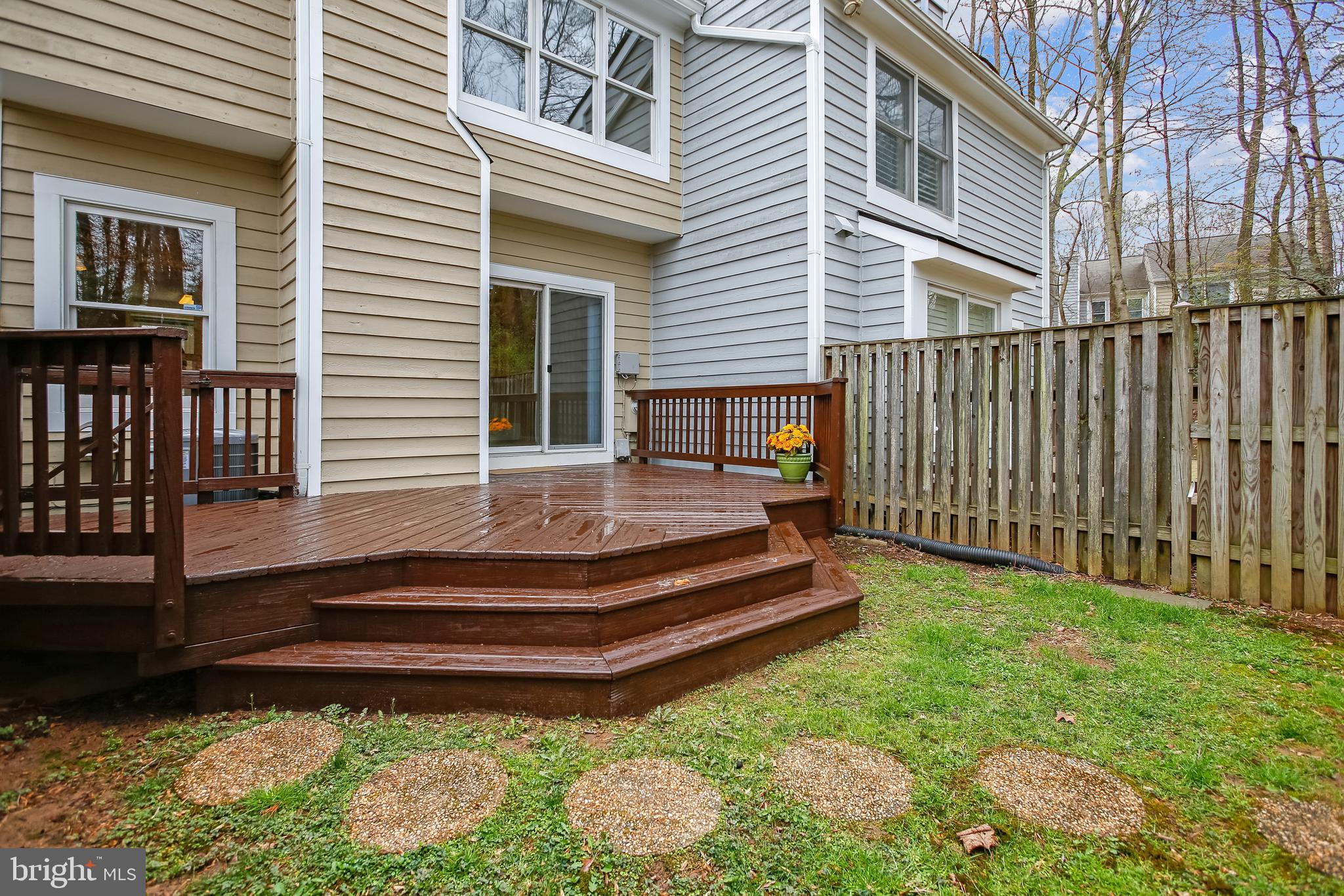 1404 Newport Spring Court Reston, VA 20194 - Photo 26 of 70 Re-Stained Ground Level Rear Deck