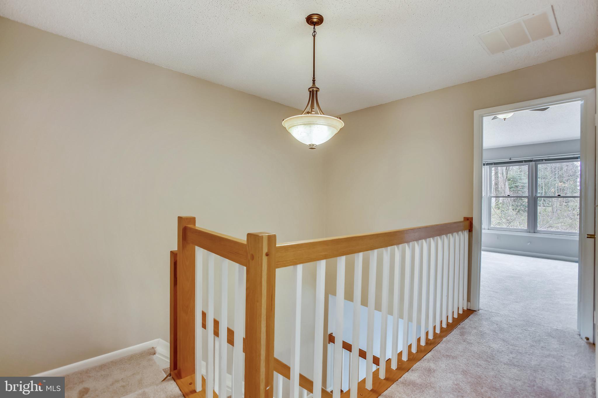 1404 Newport Spring Court Reston, VA 20194 - Photo 29 of 70 Upper Level Hallway to Primary BRM Suite