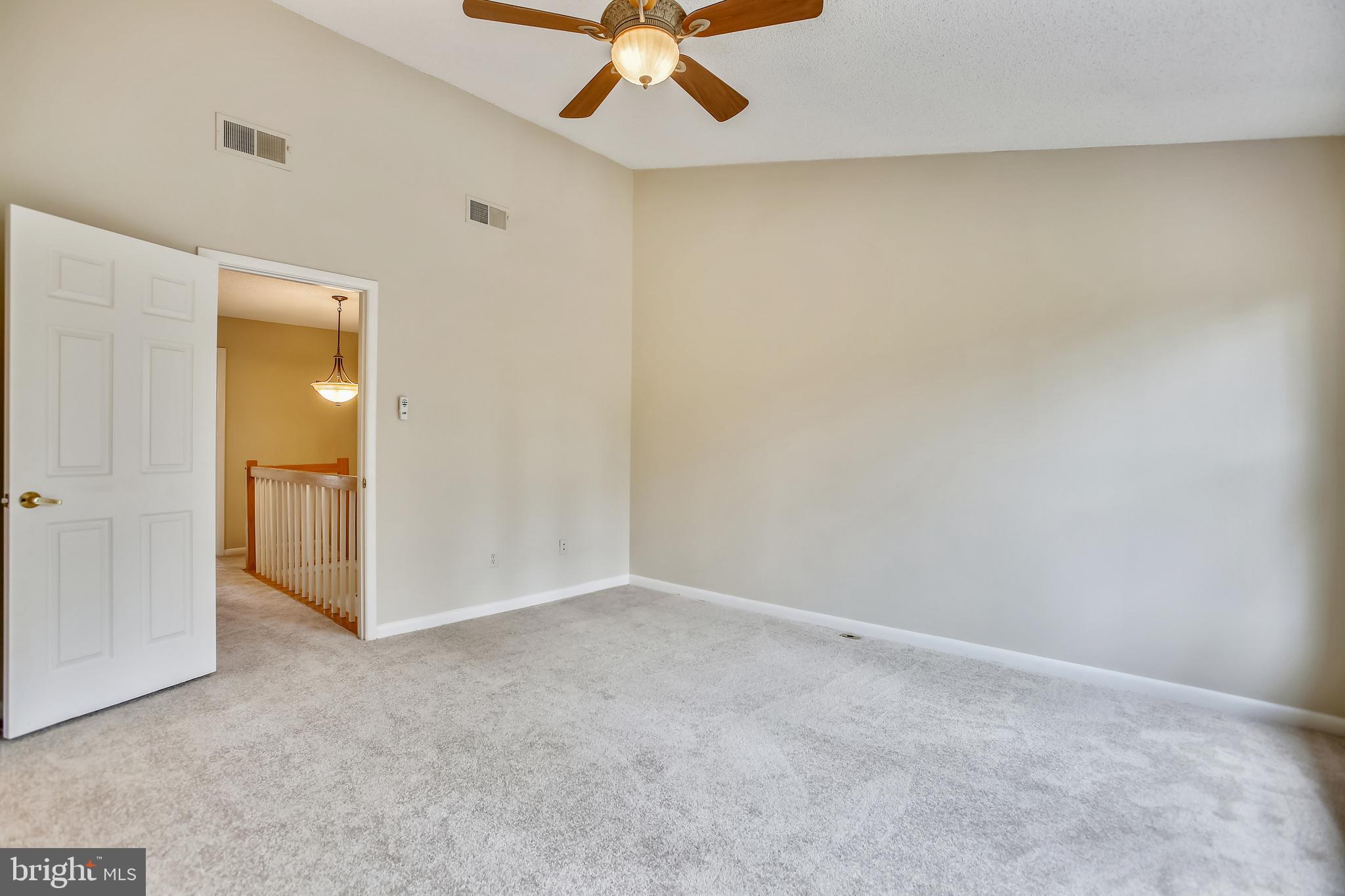 1404 Newport Spring Court Reston, VA 20194 - Photo 34 of 70 Primary Bedroom Suite with Cathedral Ceiling & Fan
