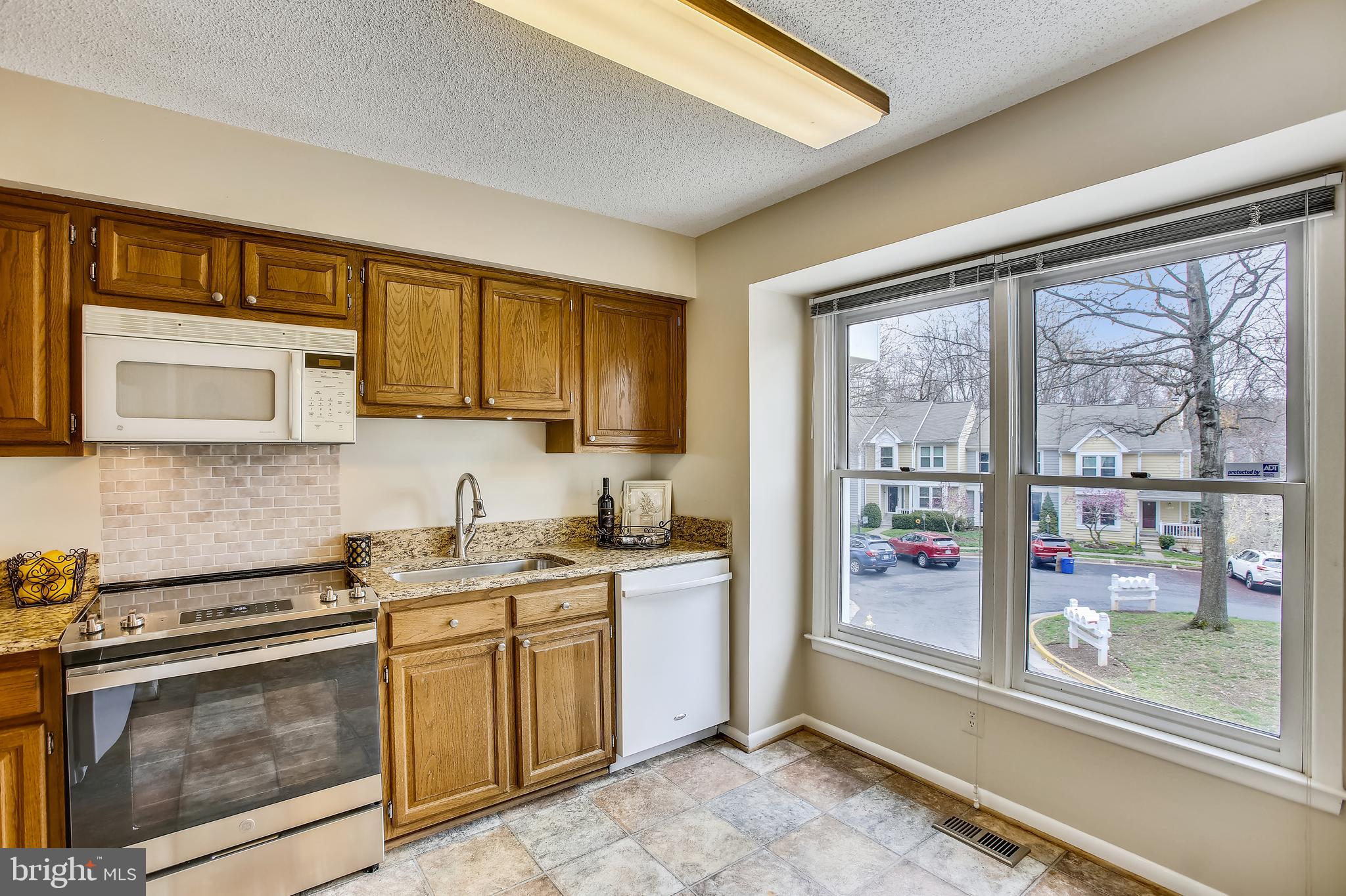 1404 Newport Spring Court Reston, VA 20194 - Photo 4 of 70 Kitchen features Granite Countertops