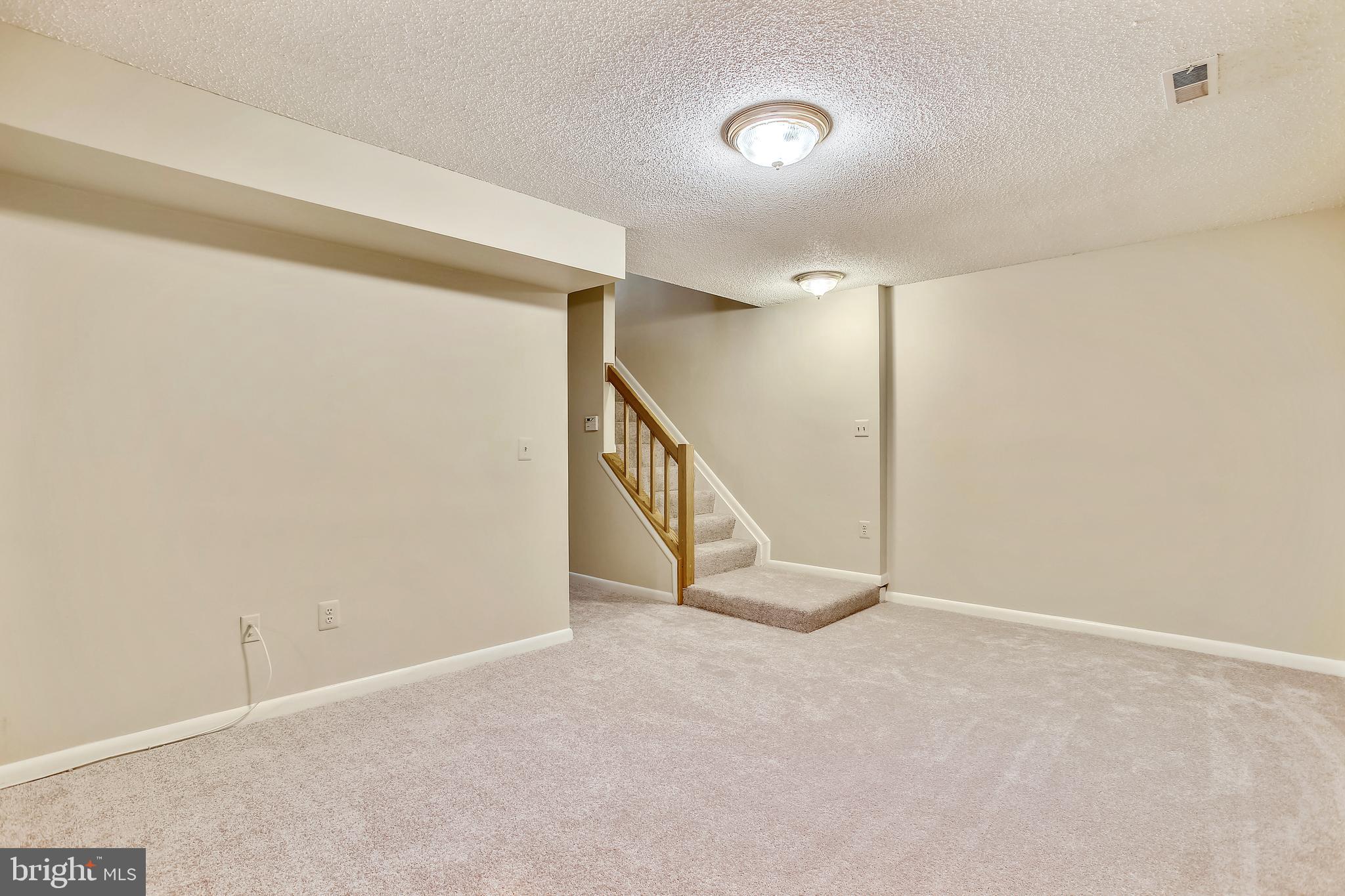 1404 Newport Spring Court Reston, VA 20194 - Photo 47 of 70 Lower Level Recreation Room