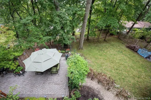 a backyard of a house with lots of green space