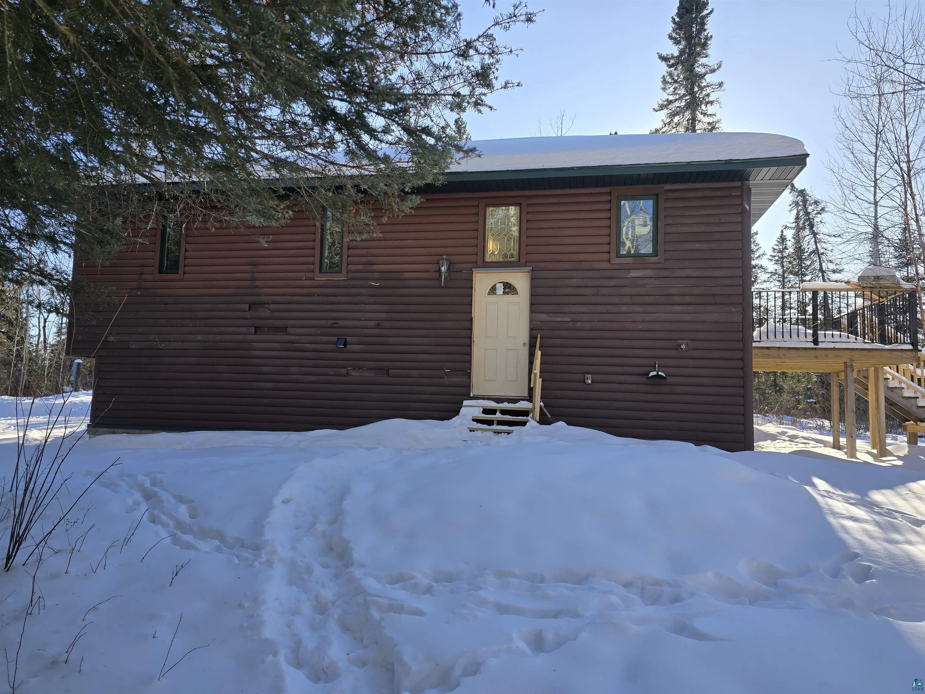 7579 Thumbnail Drive Embarrass, MN 55732 - Photo 18 of 21 View of front of property featuring a wooden deck