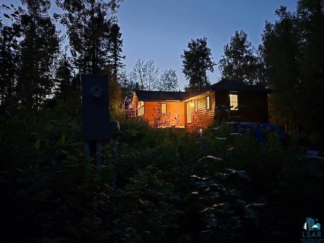 7579 Thumbnail Drive Embarrass, MN 55732 - Photo 21 of 21 View of property exterior at dusk