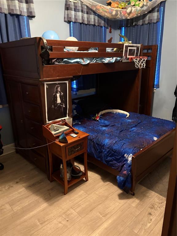 709 Calabria Way Howey-in-the-Hills, FL 34737 - Photo 16 of 26 a view of a couches and dinning table in patio