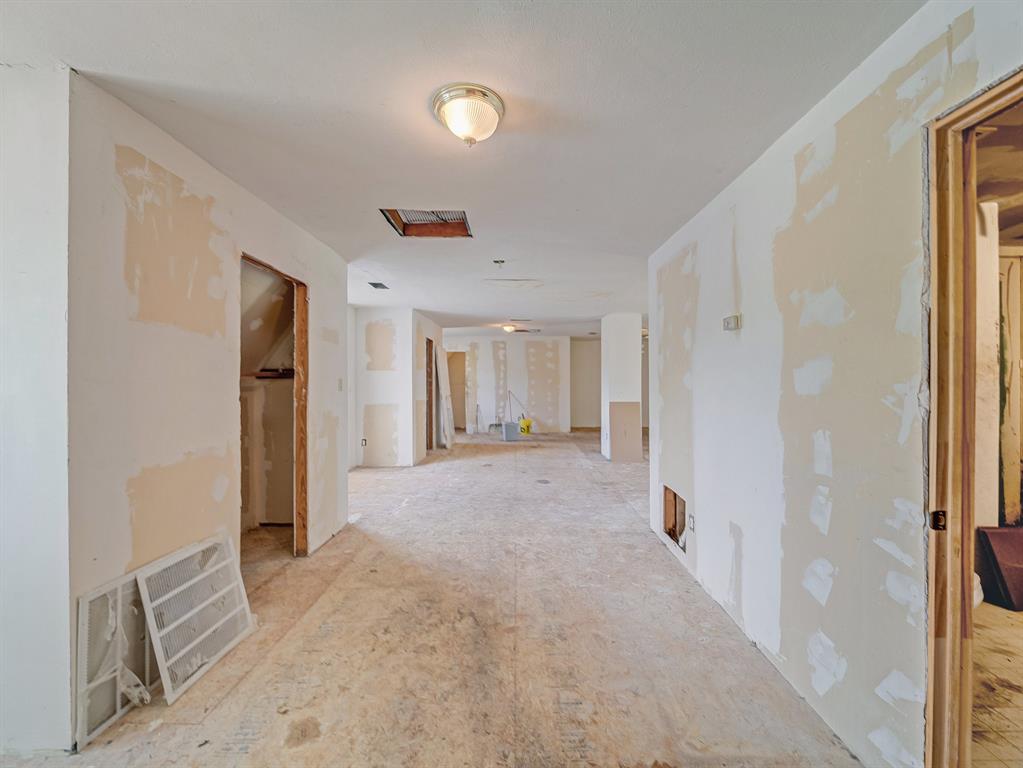13833 Indian Wells Road Dallas, TX 75253 - Photo 35 of 39 View from storage closet. Bathroom is on the right