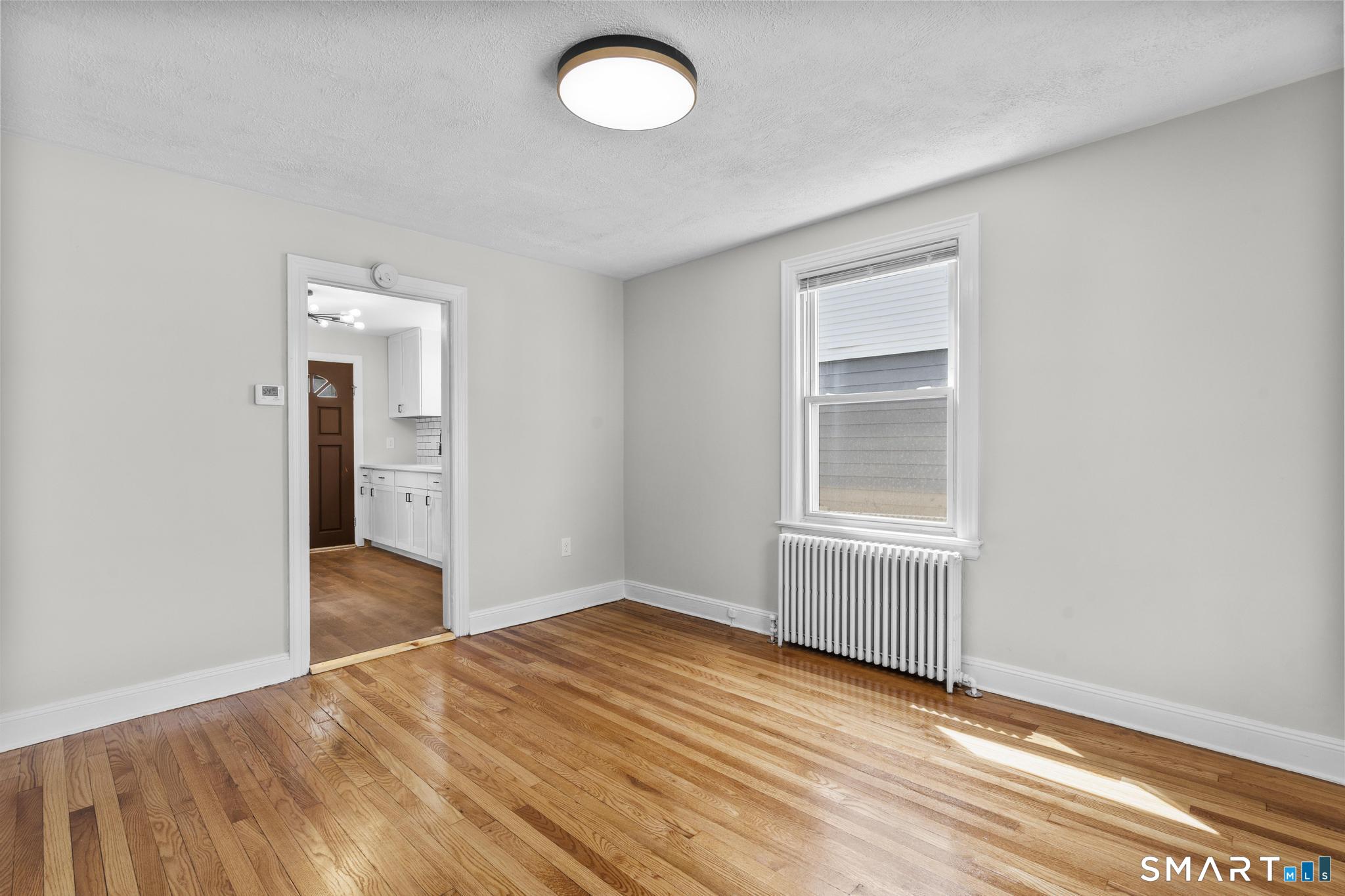 94 3rd Street Hamden, CT 06514 - Photo 13 of 30 an empty room with window