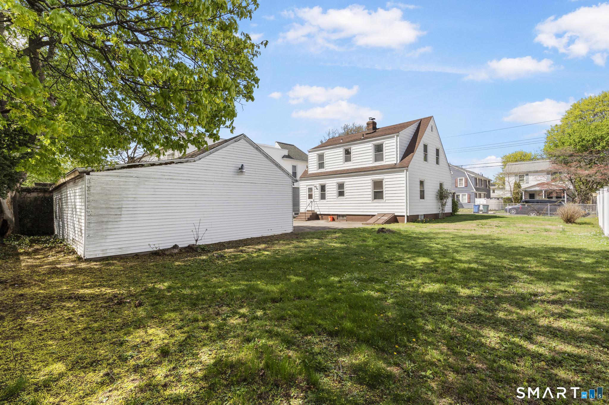 94 3rd Street Hamden, CT 06514 - Photo 27 of 30 a view of a house with a yard
