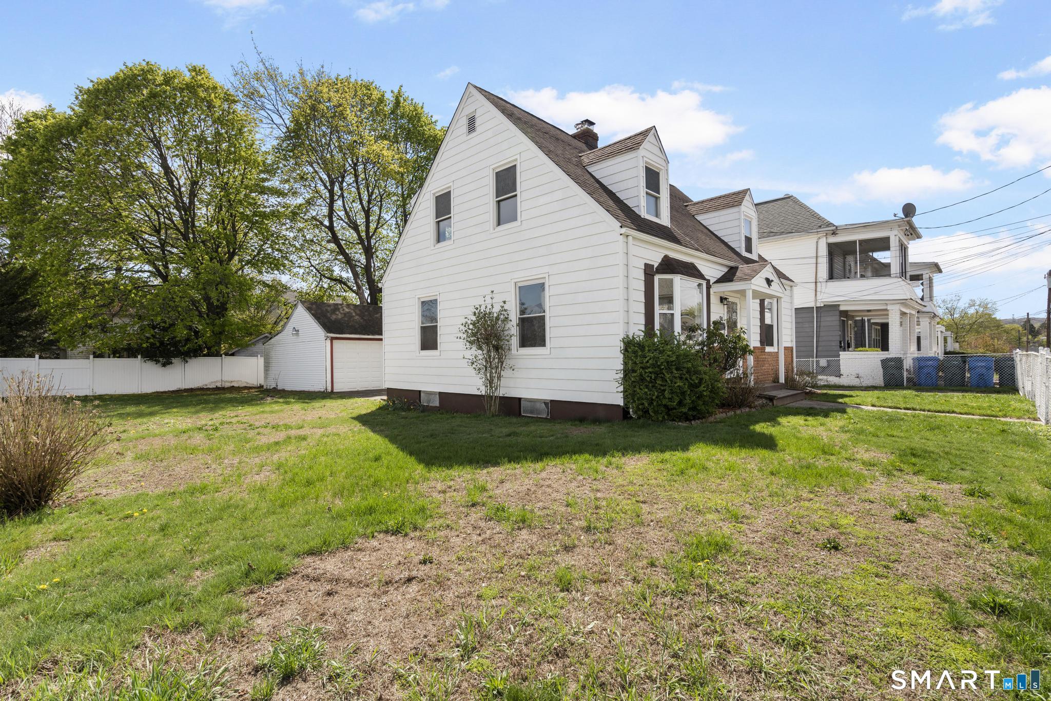 94 3rd Street Hamden, CT 06514 - Photo 28 of 30 a view of a house with a backyard