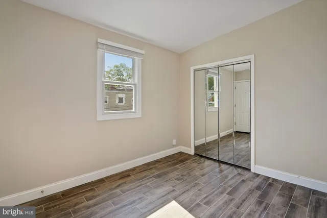 a view of a hallway with washer and dryer