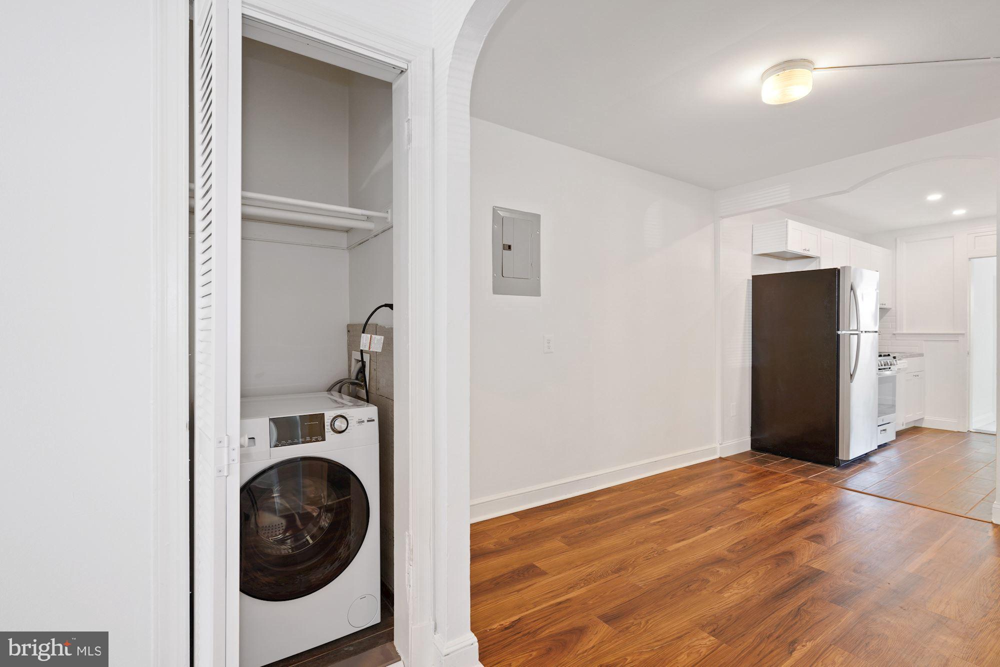 1612 17th Place Southeast Washington, DC 20020 - Photo 13 of 35 a view of a hallway with washer and dryer