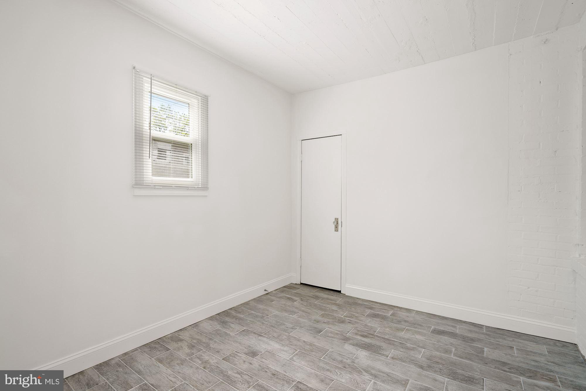 1612 17th Place Southeast Washington, DC 20020 - Photo 22 of 35 an empty room with a window