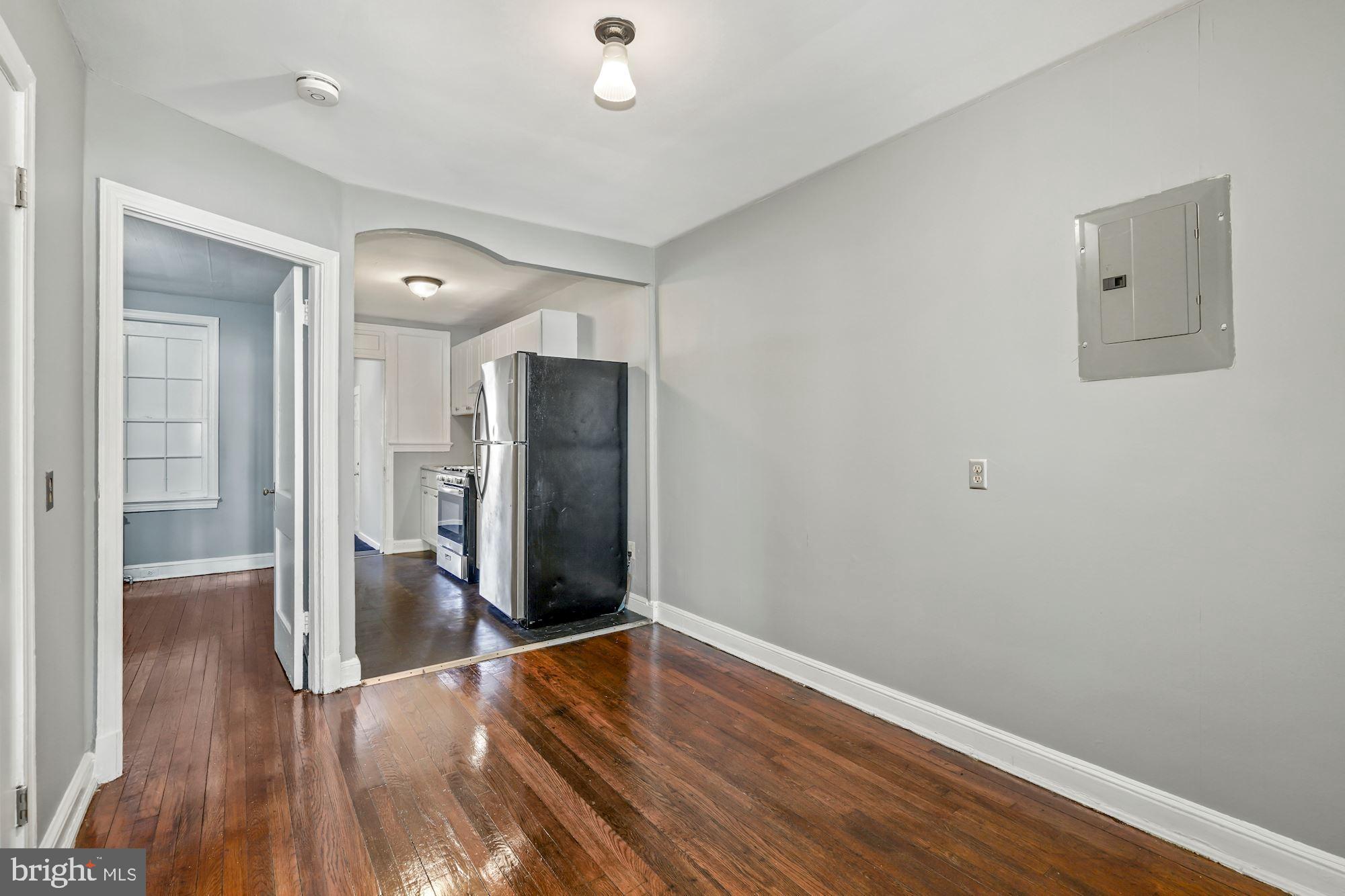 1612 17th Place Southeast Washington, DC 20020 - Photo 27 of 35 a view of a hallway with wooden floor