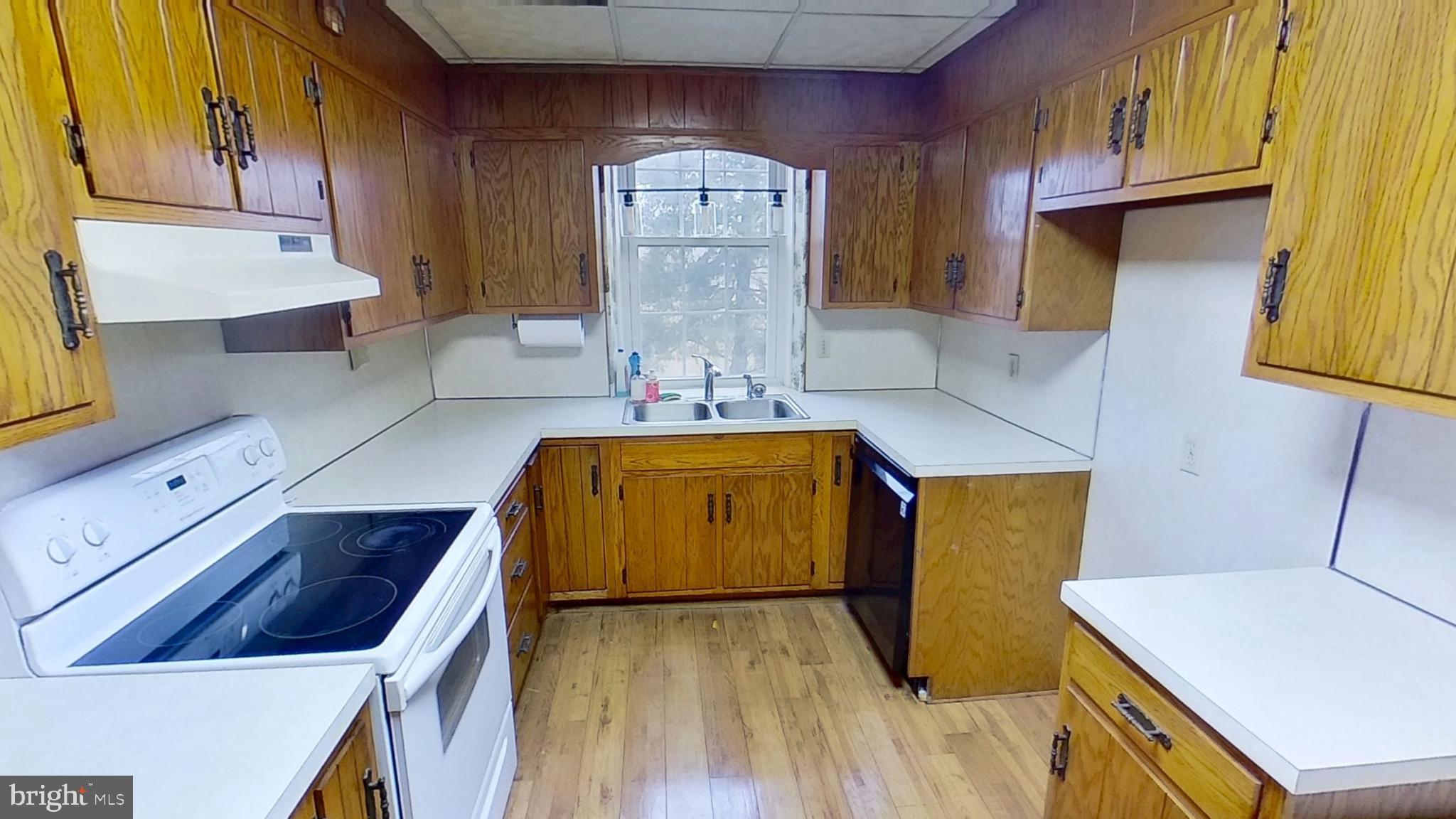 6250 Sterner Drive Spring Grove, PA 17362 - Photo 2 of 16 a kitchen with a sink a stove and cabinets