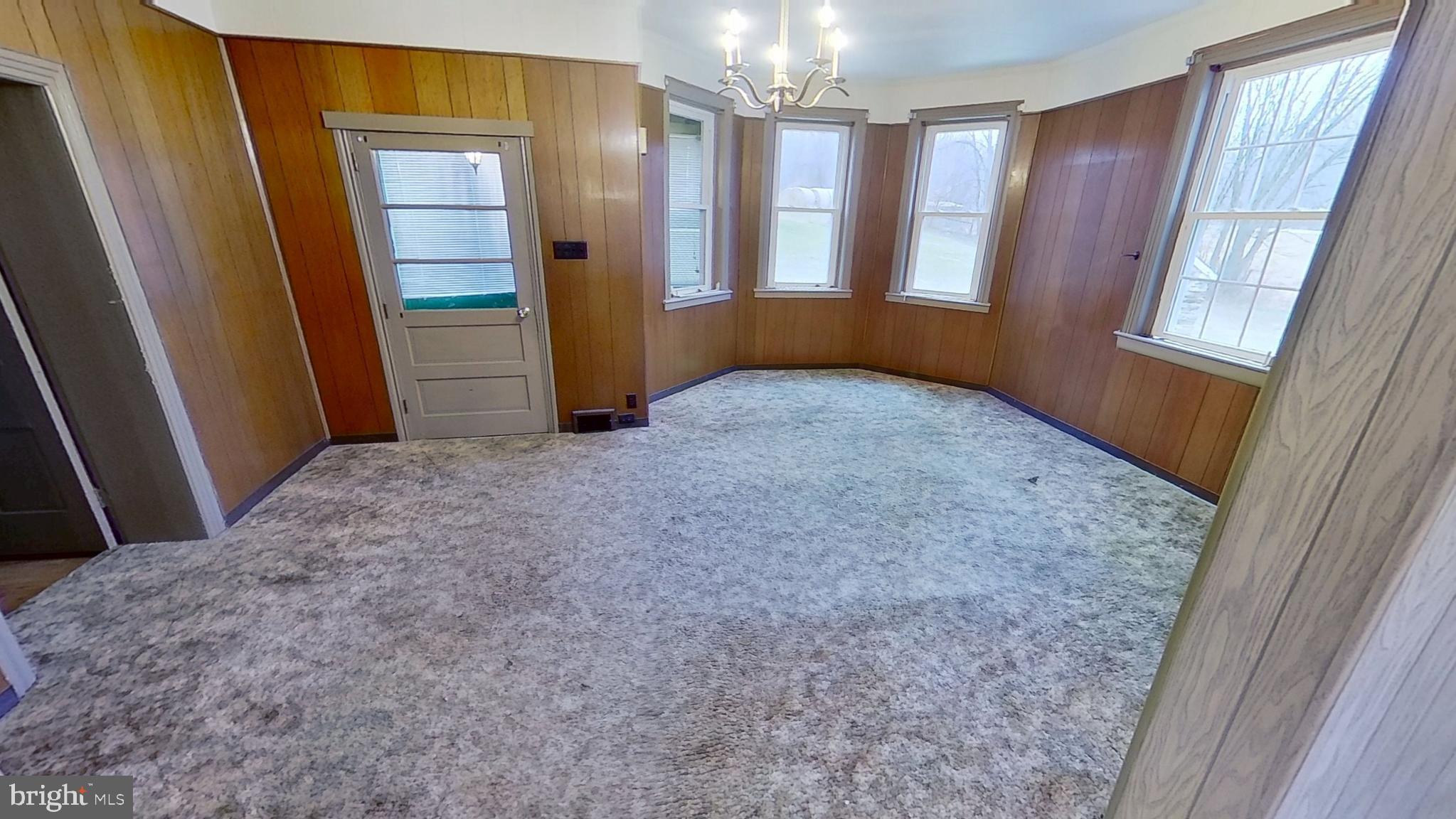 6250 Sterner Drive Spring Grove, PA 17362 - Photo 4 of 16 an empty room with windows and entrance