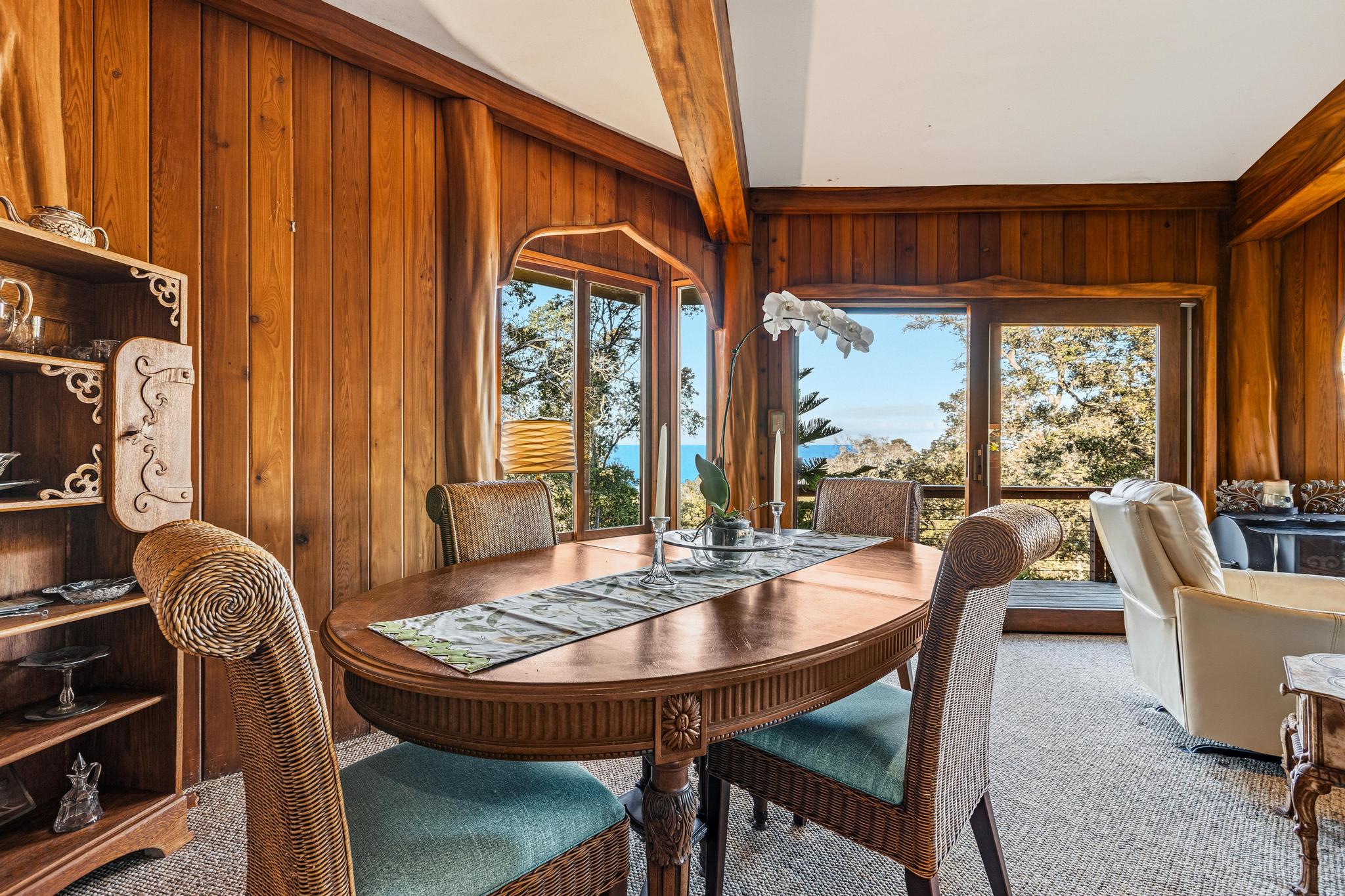 43-5745 Old Stable Road Paauilo, HI 96776 - Photo 14 of 30 a dining room with furniture and a floor to ceiling window