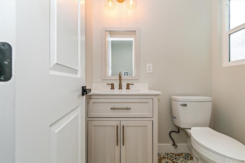 14101 Cameron Lane North Tustin, CA 92705 - Photo 17 of 36 a bedroom with a bed and a window