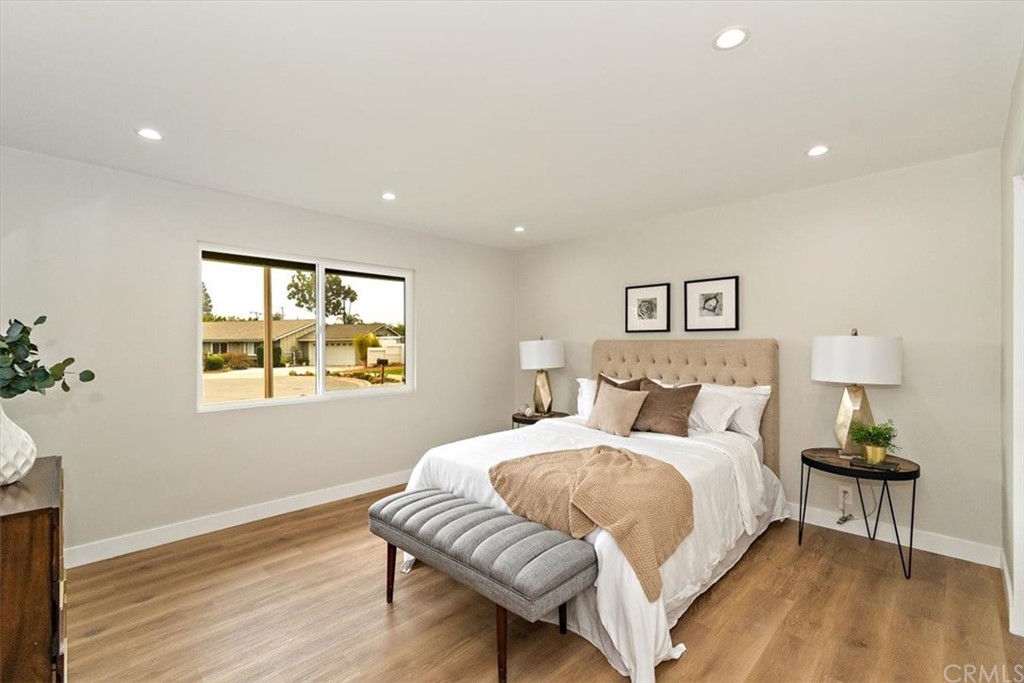 14101 Cameron Lane North Tustin, CA 92705 - Photo 18 of 36 a bedroom with a bed and a dresser