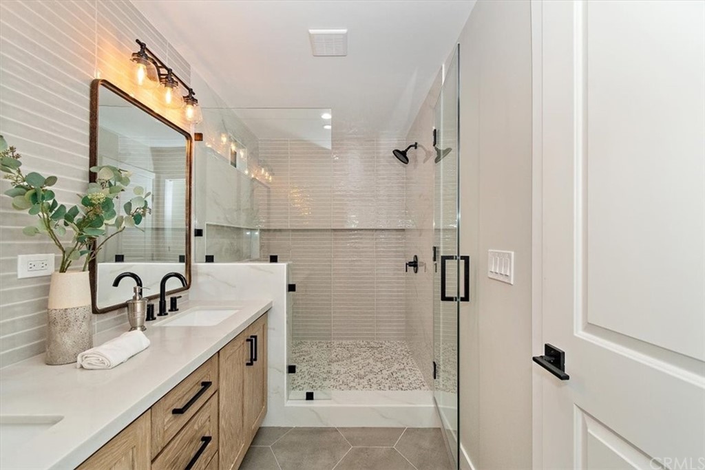 14101 Cameron Lane North Tustin, CA 92705 - Photo 23 of 36 a view of an empty room with wooden floor and a window