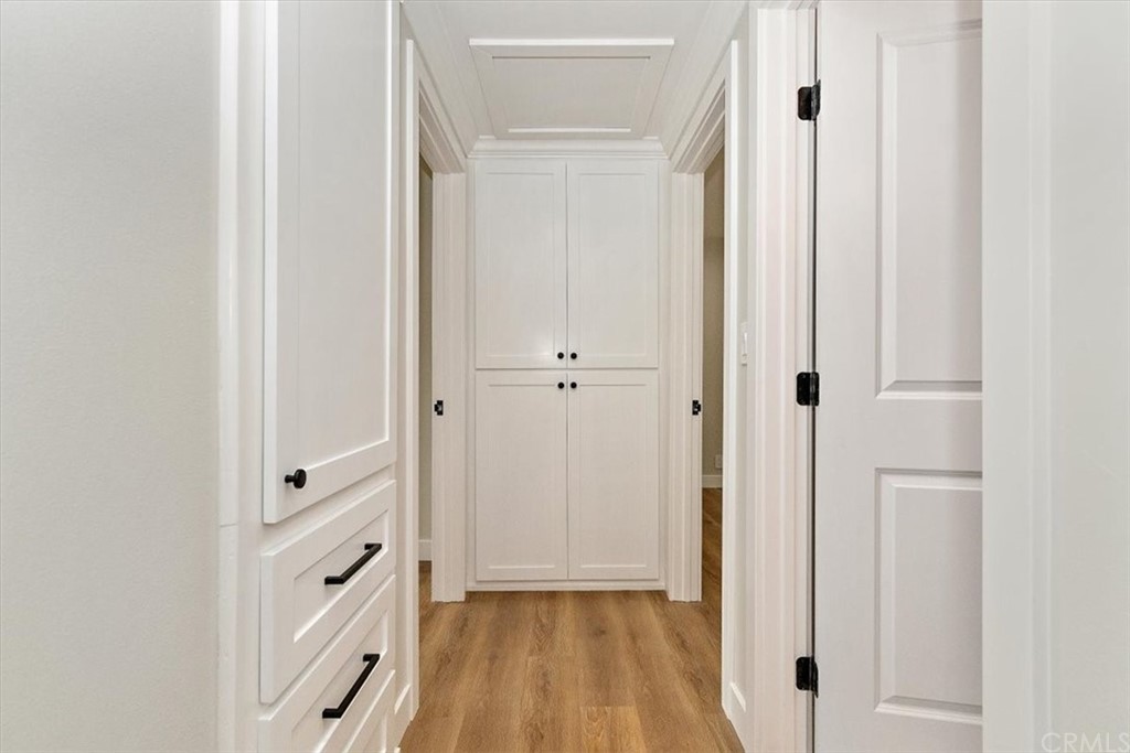 14101 Cameron Lane North Tustin, CA 92705 - Photo 25 of 36 a bathroom with a sink a toilet a mirror and shower