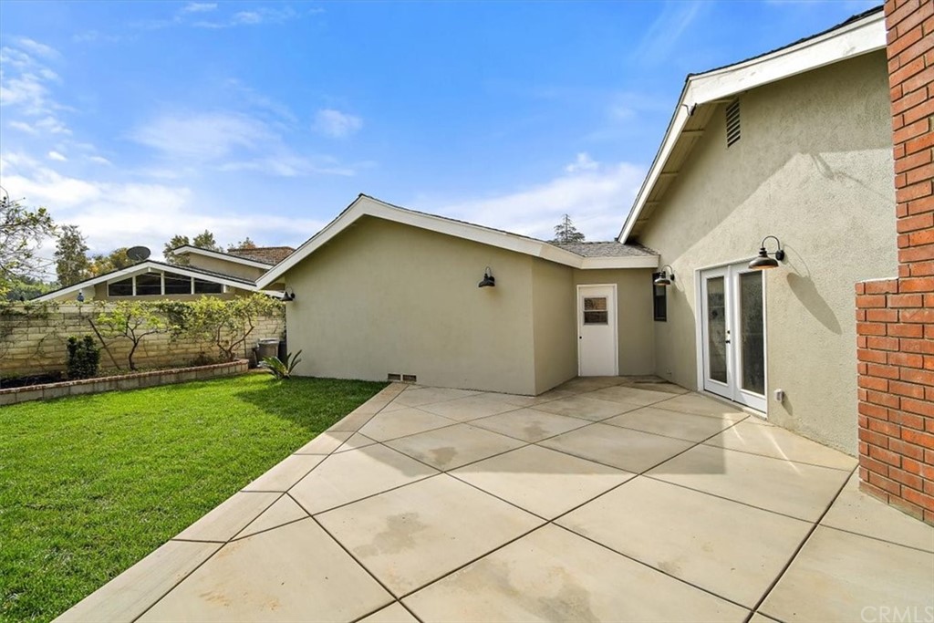 14101 Cameron Lane North Tustin, CA 92705 - Photo 34 of 36 a view of a pathway with a yard