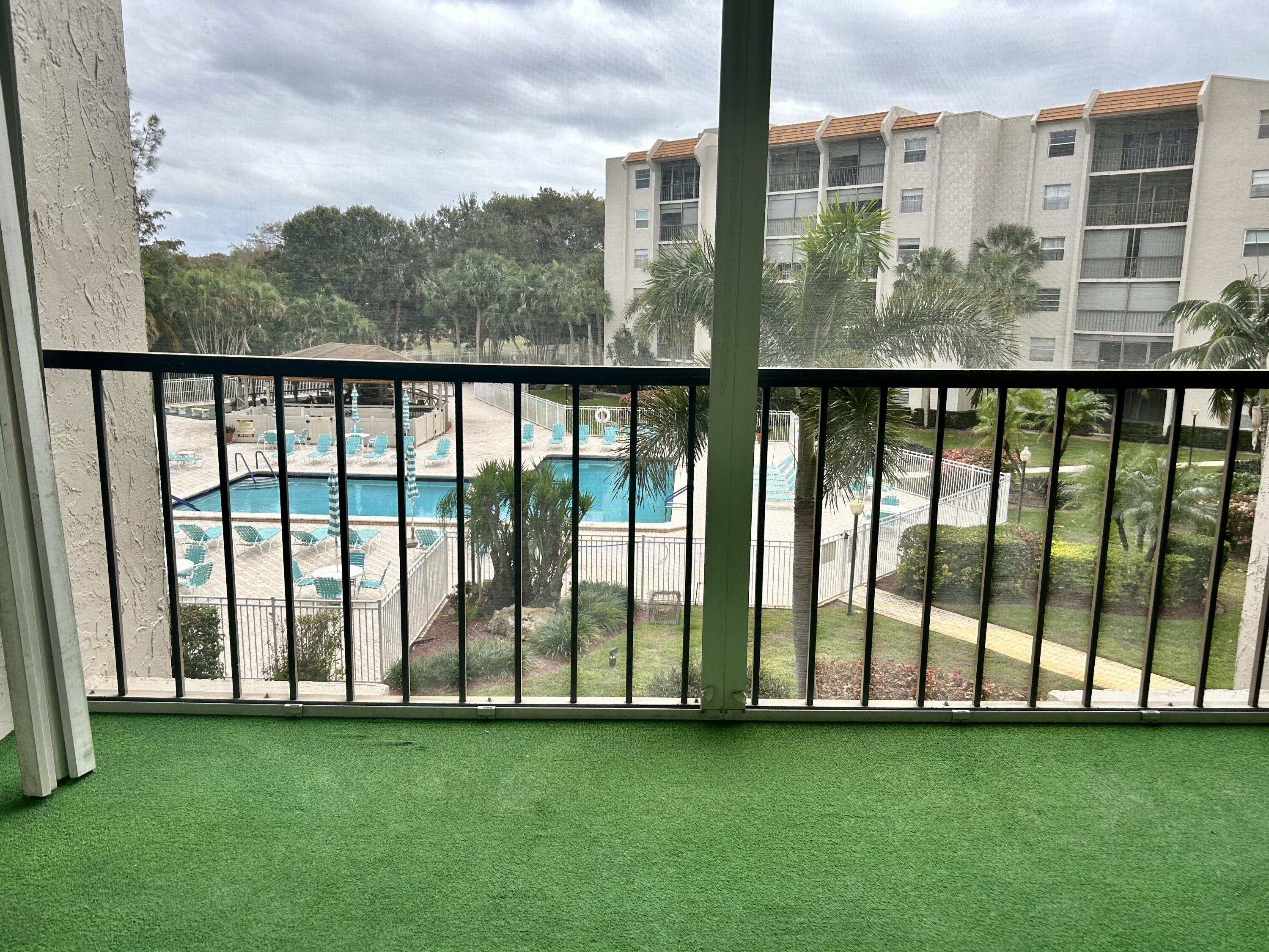 3930 Inverrary Boulevard, Unit 303D Lauderhill, FL 33319 - Photo 5 of 28 a view of a balcony with yard