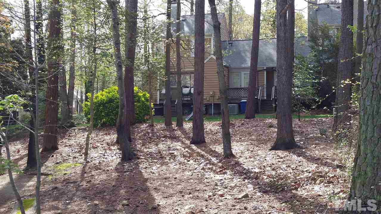 3802 Axle Lane Raleigh, NC 27616 - Photo 2 of 14 a backyard of a house with lots of green space
