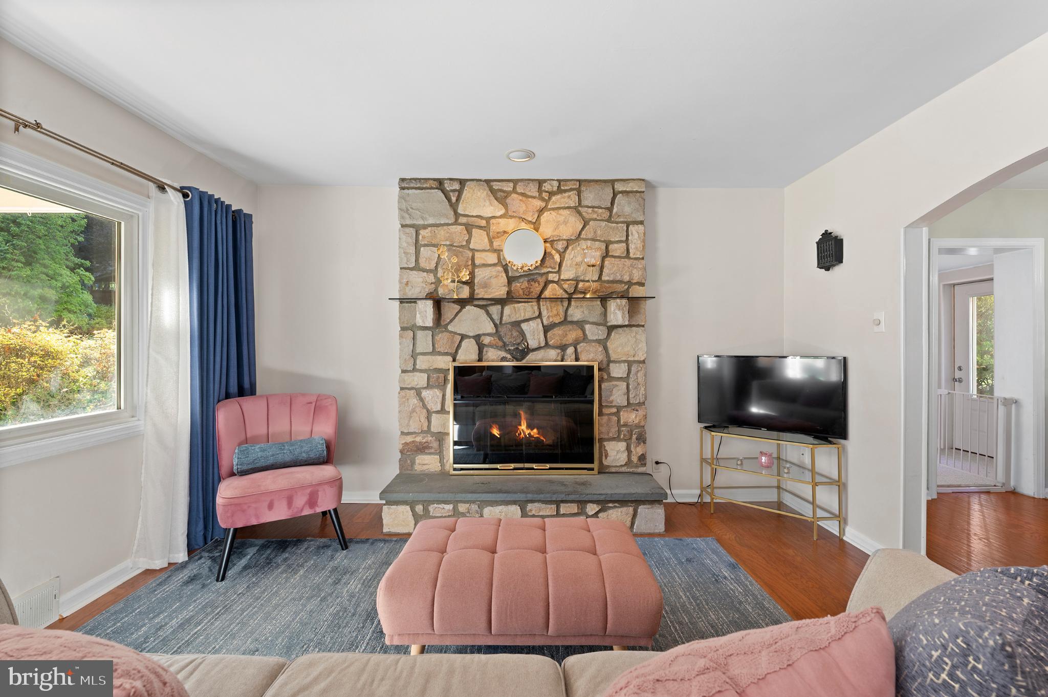 359 Valley-View Road King of Prussia, PA 19406 - Photo 17 of 51 Cozy living room with stone fireplace charm.