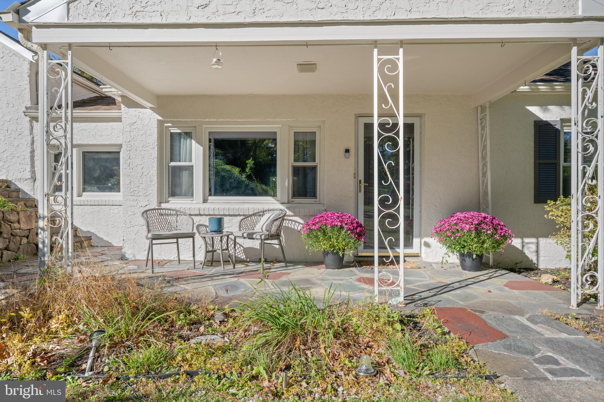 359 Valley-View Road King of Prussia, PA 19406 - Photo 8 of 51 Charming porch with vibrant blooms.