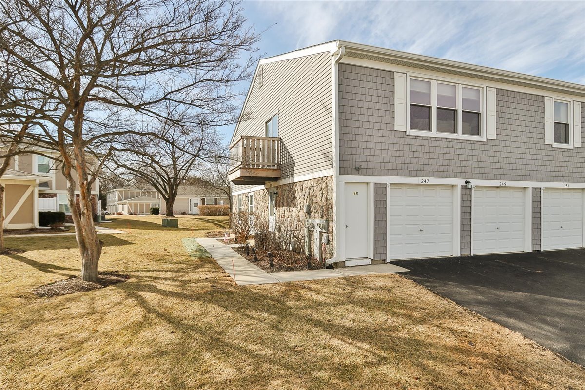 247 Nantucket Harbor Schaumburg, IL 60193 - Photo 2 of 25 a view of a house with snow on the road