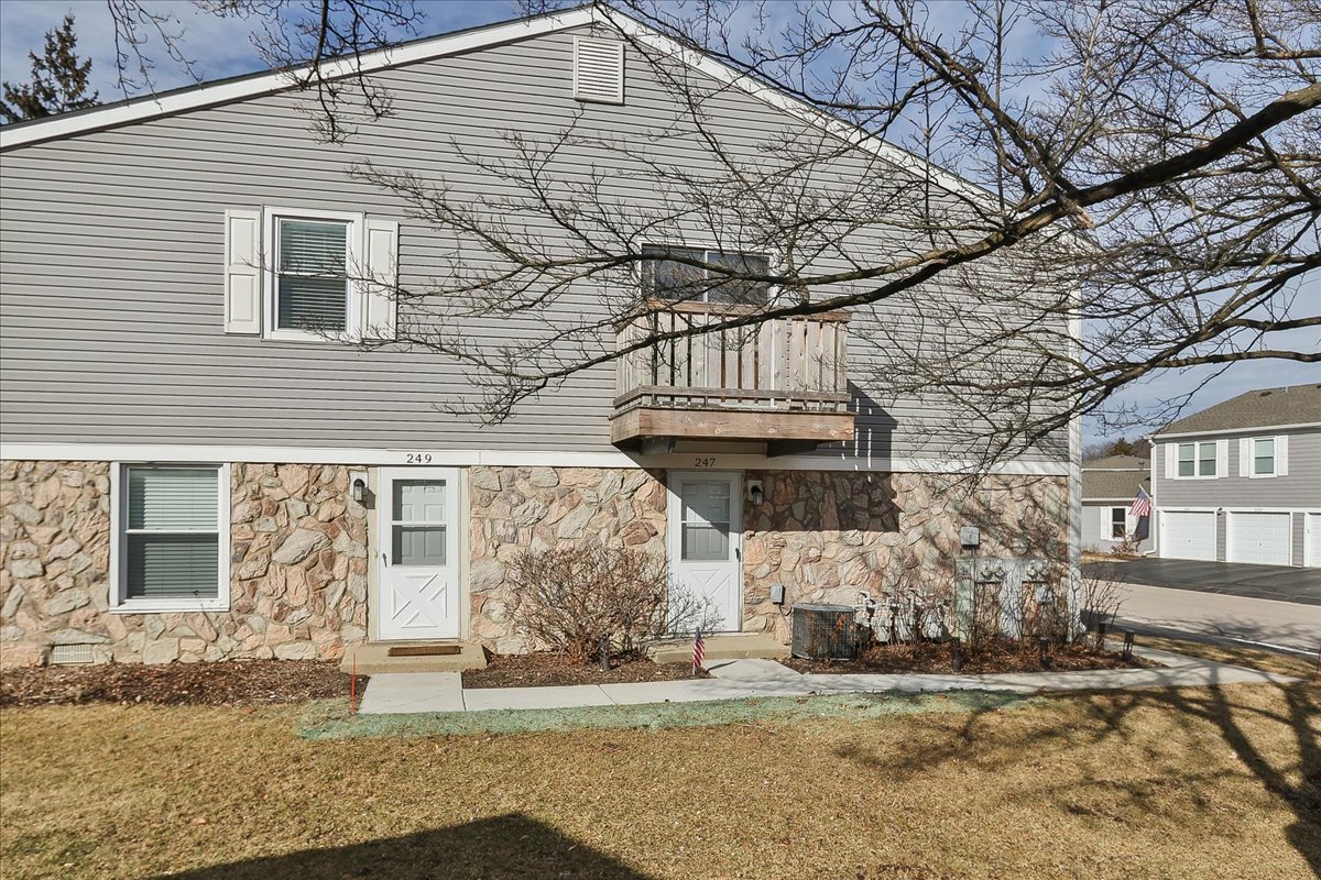 247 Nantucket Harbor Schaumburg, IL 60193 - Photo 22 of 25 a front view of a house with a yard