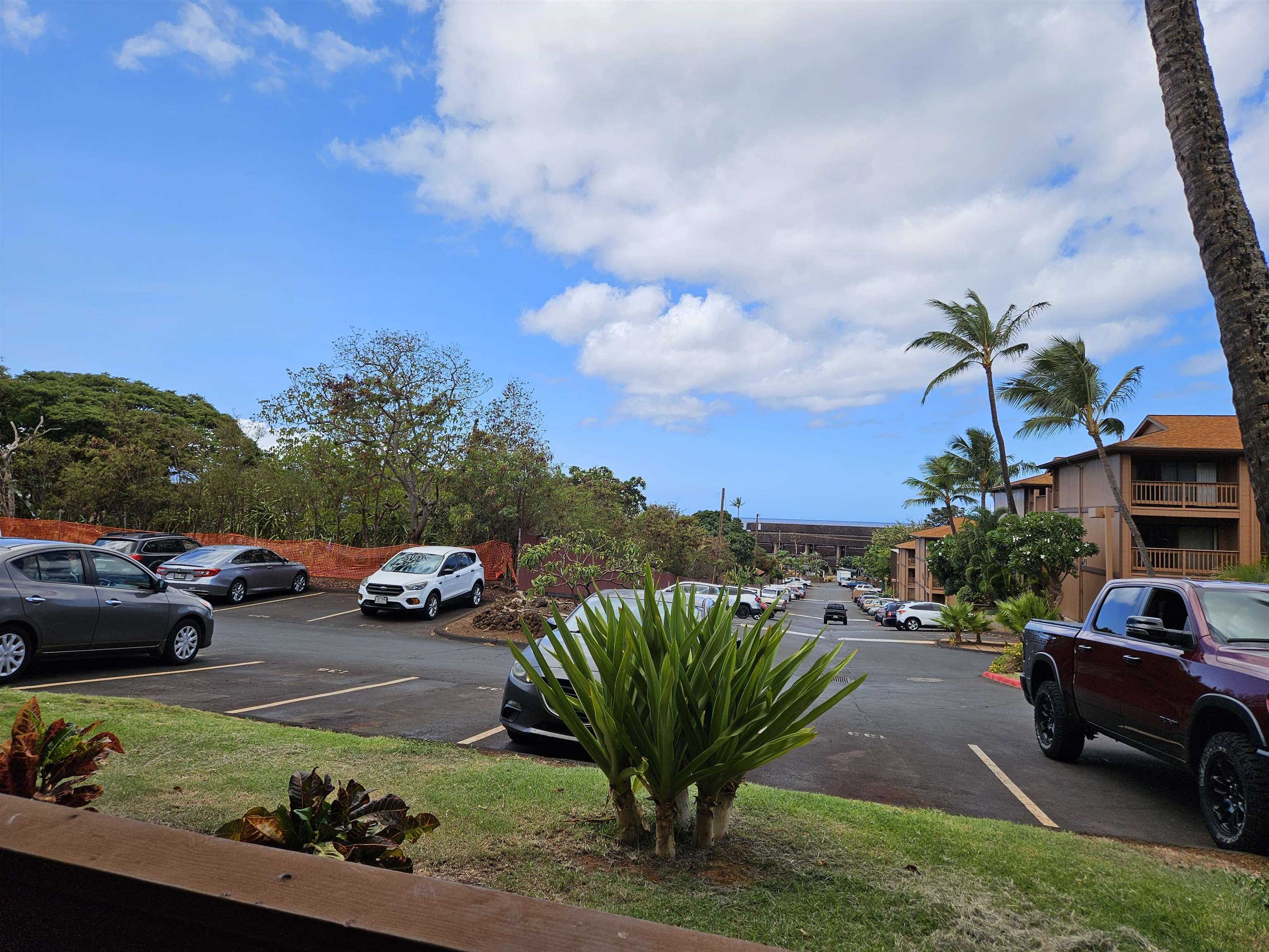 3740 Lower Honoapiilani Road, Unit G108 Lahaina, HI 96761 - Photo 11 of 24 a view of a street with cars on road