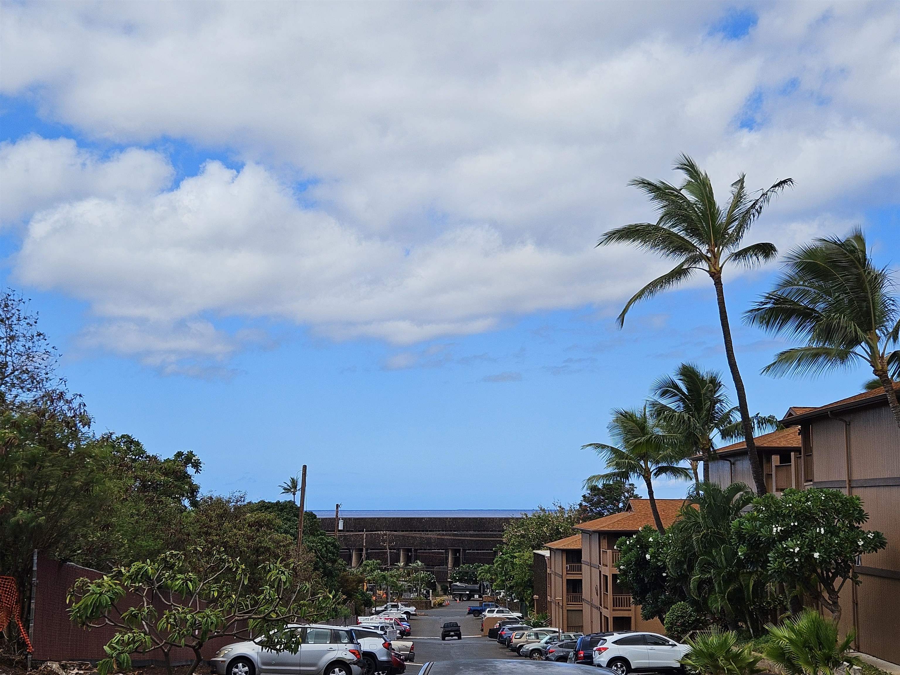 3740 Lower Honoapiilani Road, Unit G108 Lahaina, HI 96761 - Photo 12 of 24 a view of multiple houses with a street