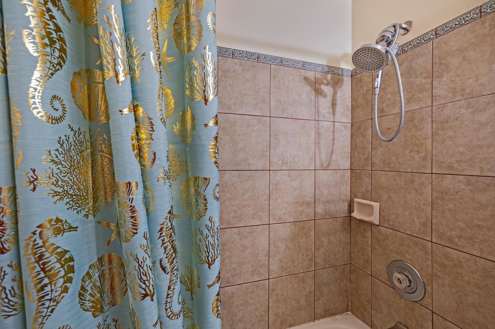 3740 Lower Honoapiilani Road, Unit G108 Lahaina, HI 96761 - Photo 16 of 24 a bathroom with a shower