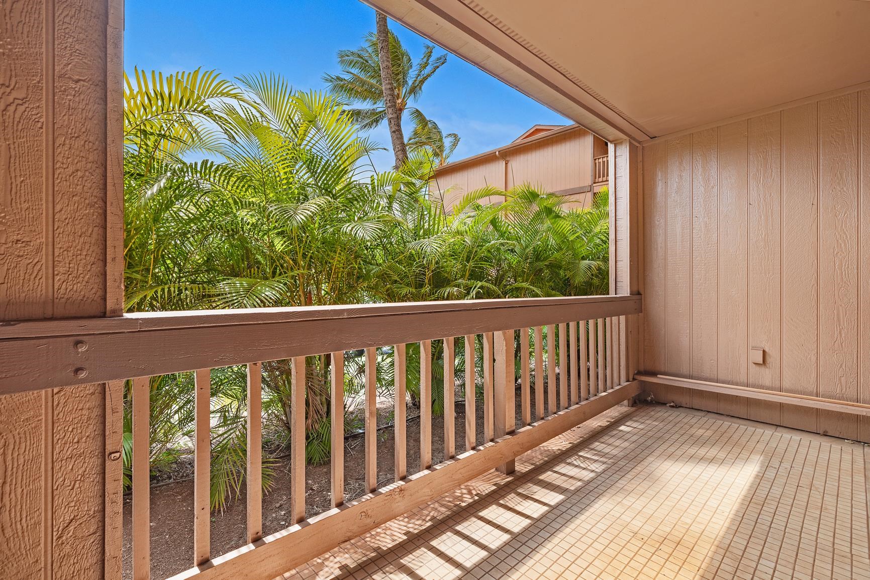 3740 Lower Honoapiilani Road, Unit G108 Lahaina, HI 96761 - Photo 3 of 24 a view of a two chairs in the balcony