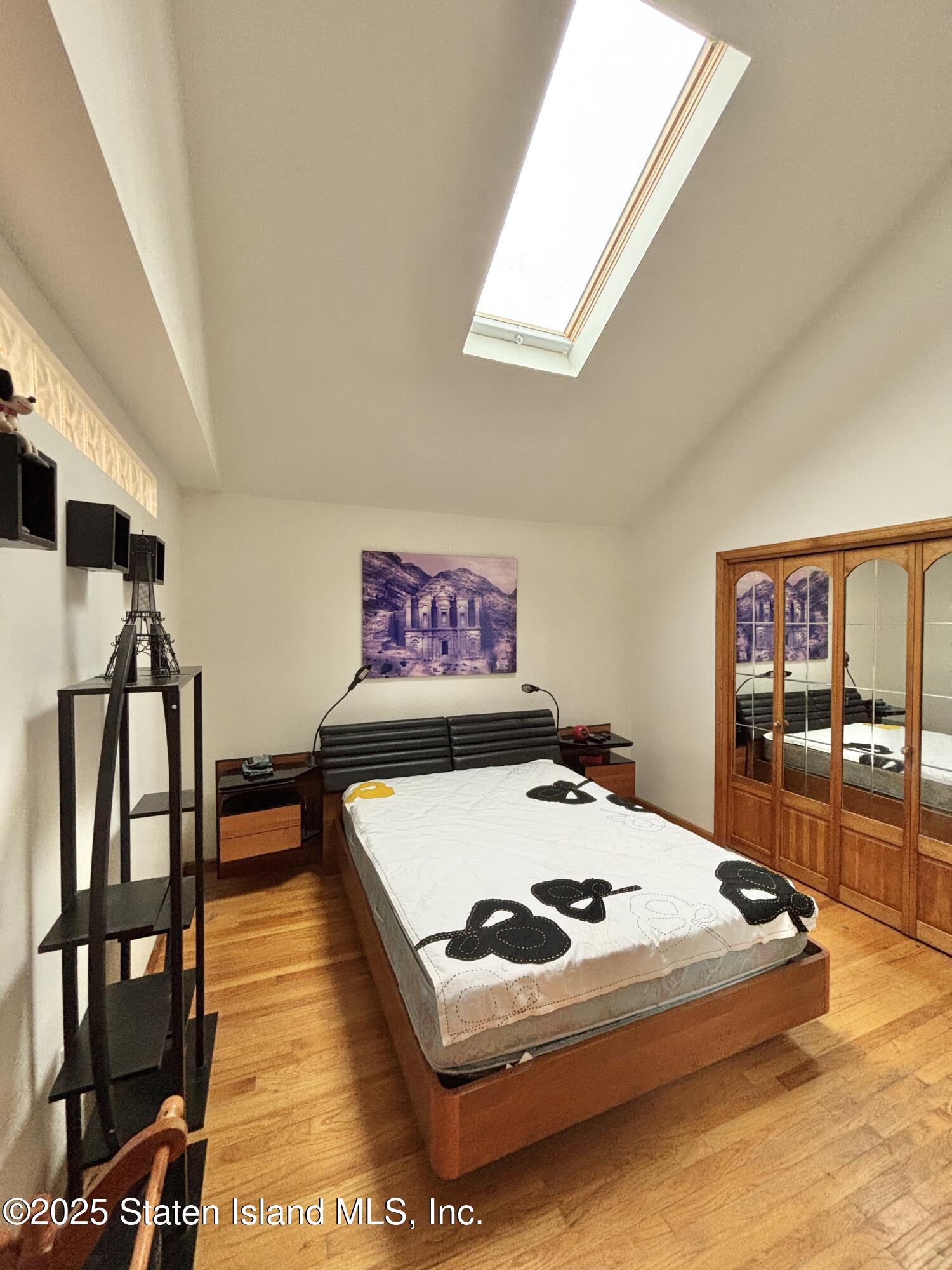 456 Oder Avenue Staten Island, NY 10304 - Photo 5 of 8 a living room with furniture pool table and a window