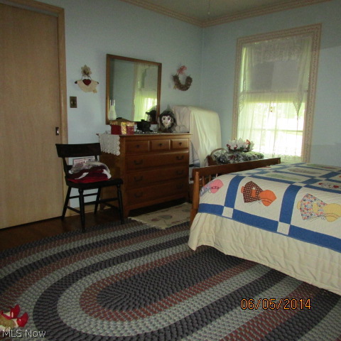 3901 Industry Road Rootstown, OH 44272 - Photo 18 of 22 The bedrooms are spacious and have lovely hardwood floors.