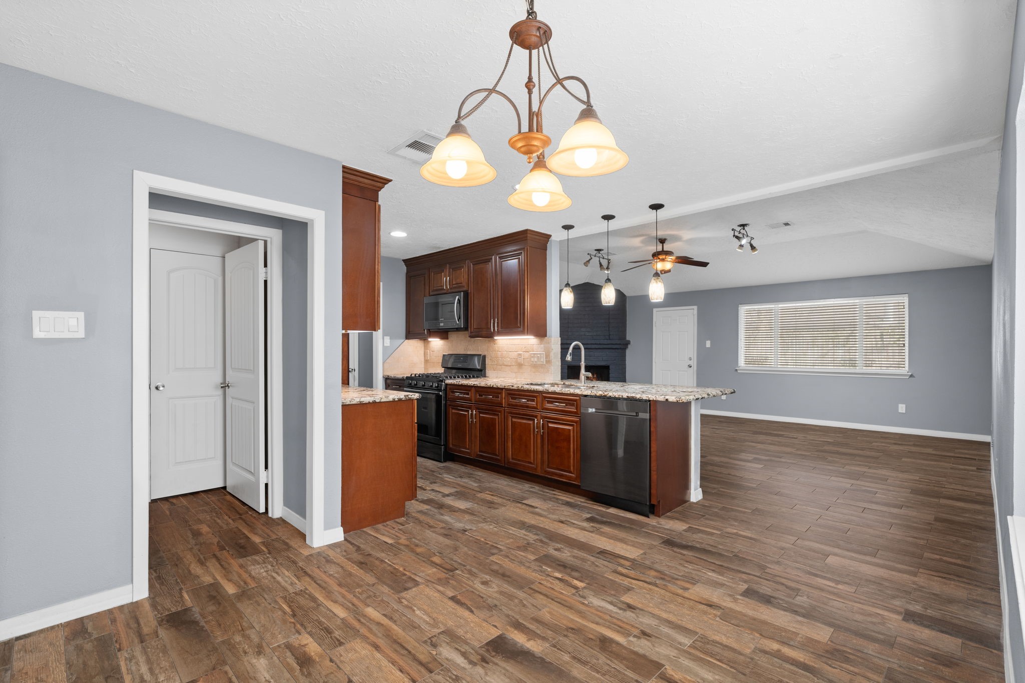 2622 Strait Lane Houston, TX 77084 - Photo 16 of 47 a view of kitchen with wooden floor