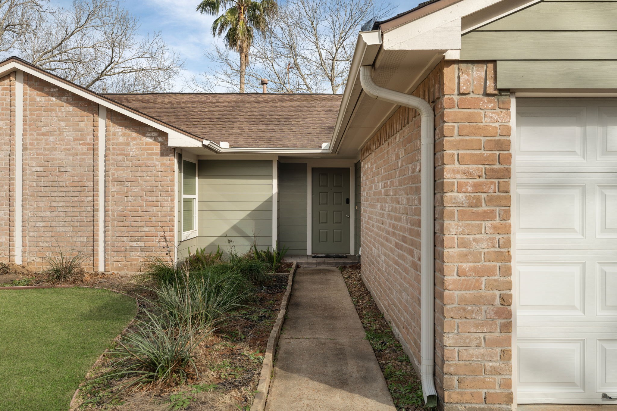 2622 Strait Lane Houston, TX 77084 - Photo 2 of 47 a front view of a house with garden