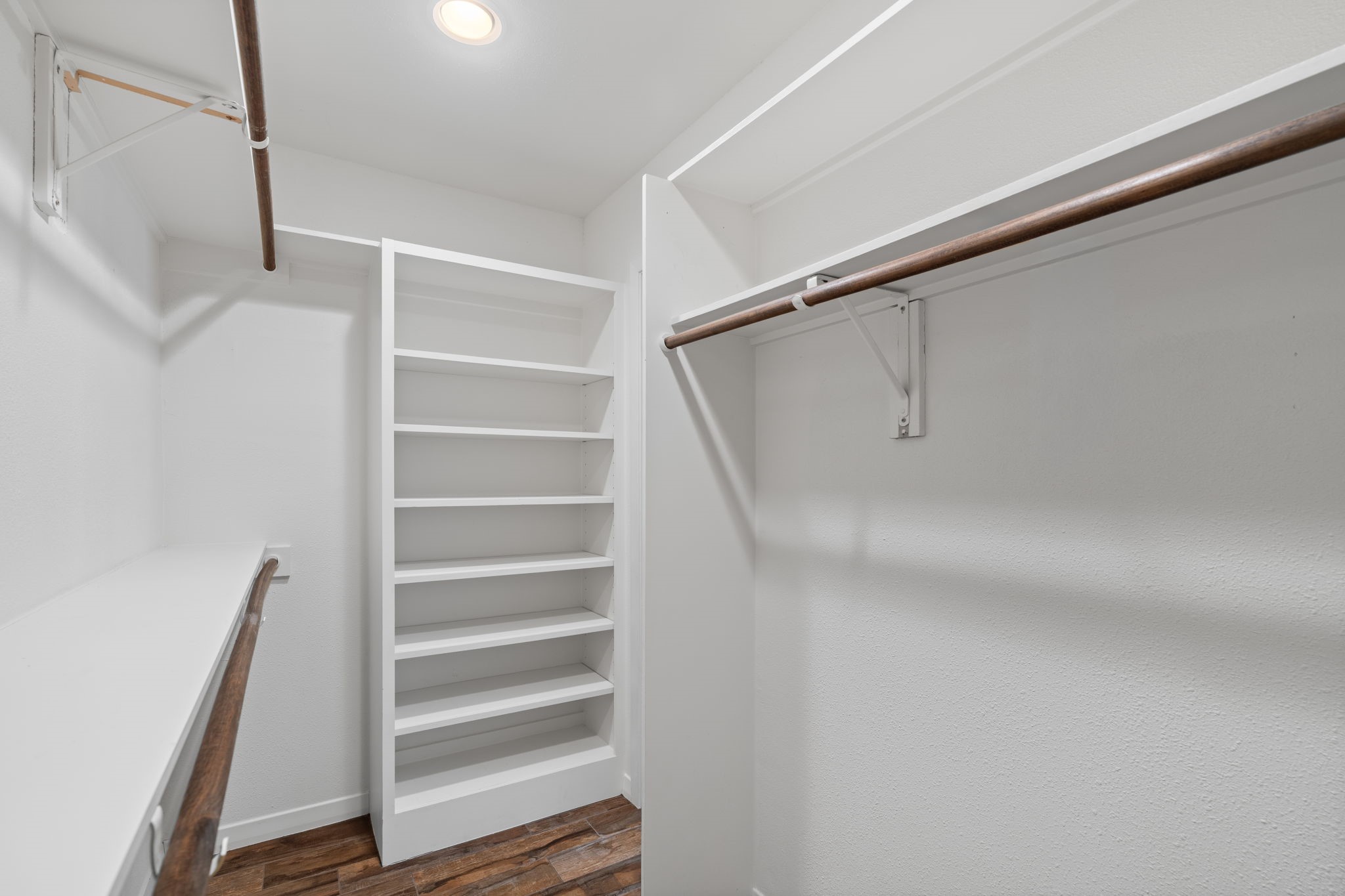 2622 Strait Lane Houston, TX 77084 - Photo 26 of 47 a view of walk in closet with empty racks