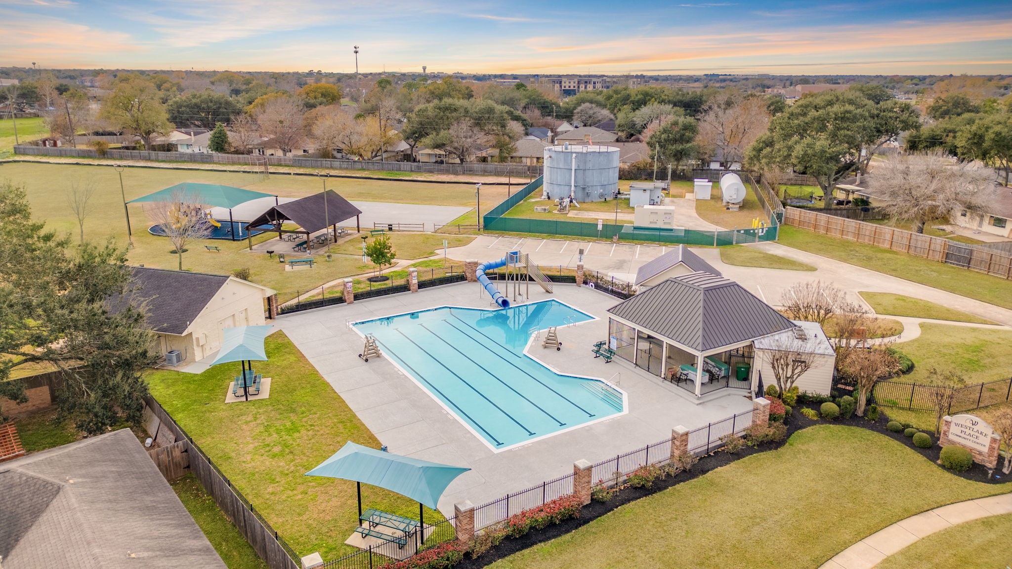 2622 Strait Lane Houston, TX 77084 - Photo 41 of 47 a view of a swimming pool with a lounge chairs