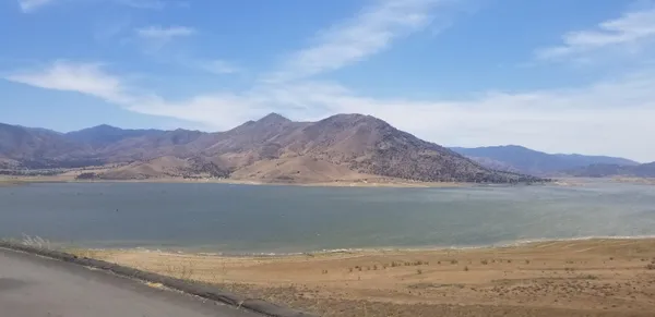 a view of ocean with mountain