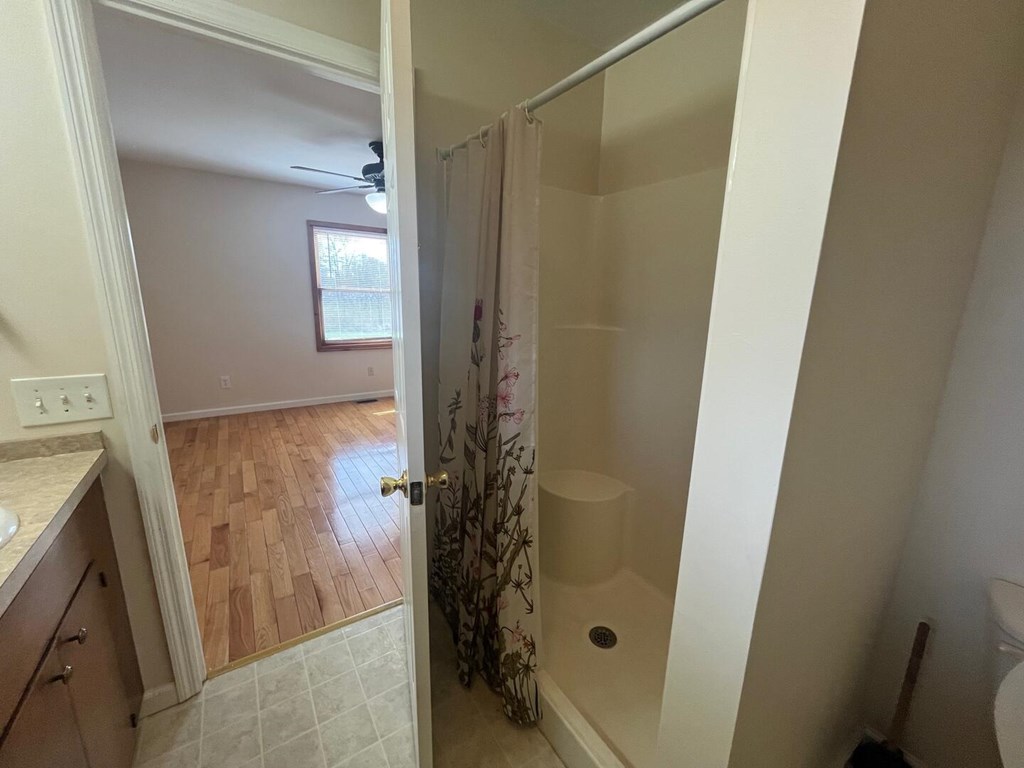 142 Arrowhead Trail Hayesville, NC 28904 - Photo 18 of 41 a bathroom with a shower and a sink